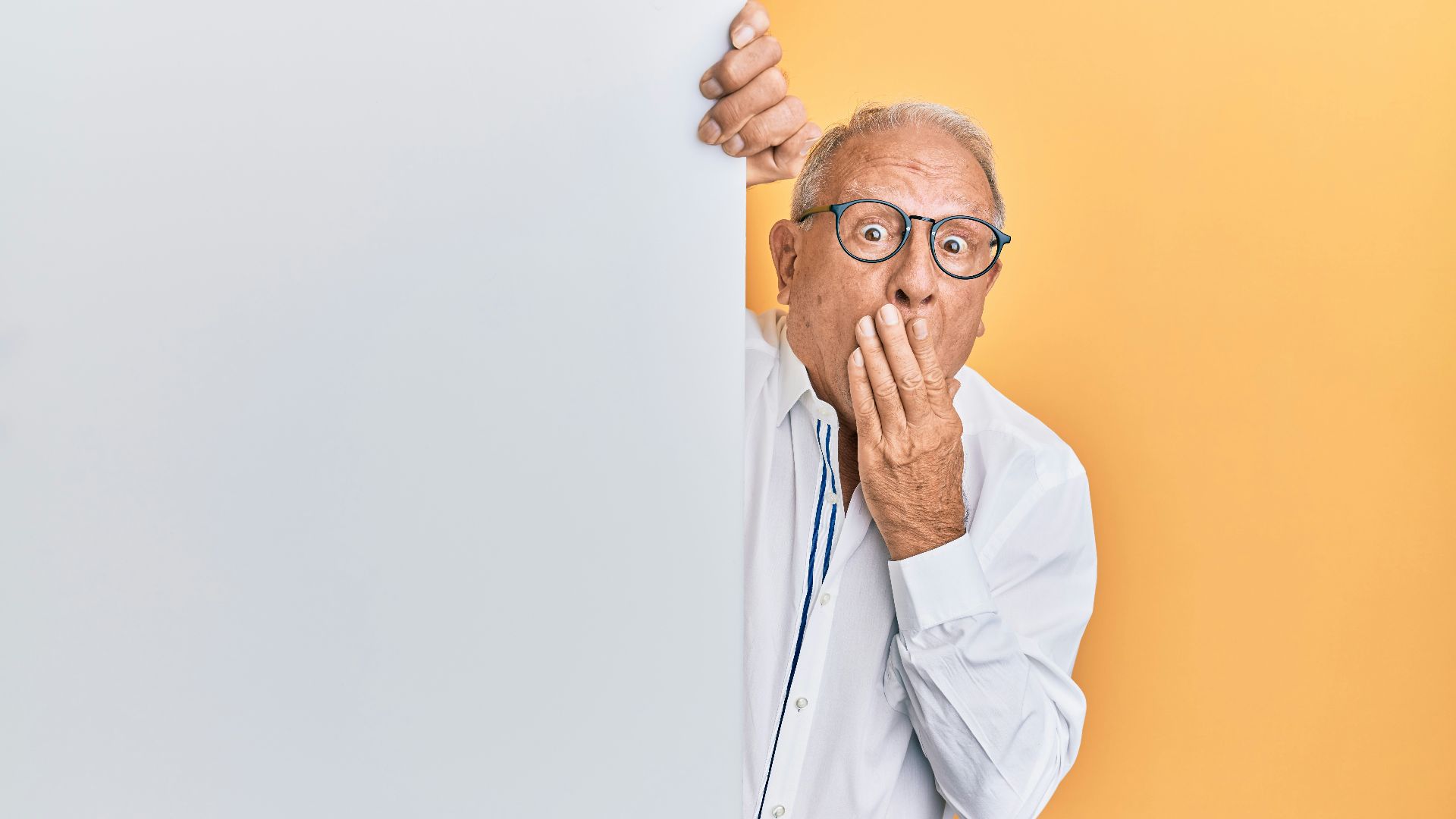 man in white dress shirt wearing black framed eyeglasses