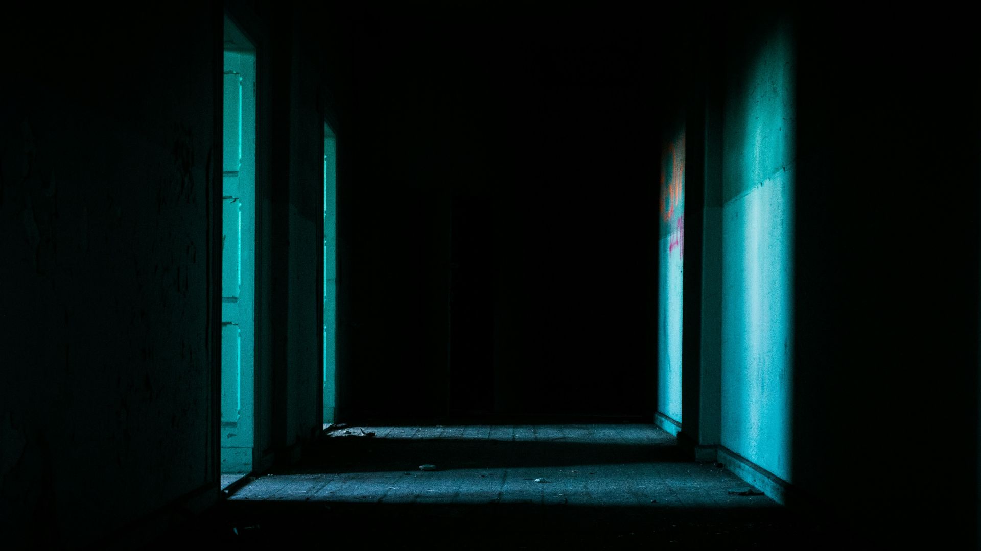 open door beside white paint wall