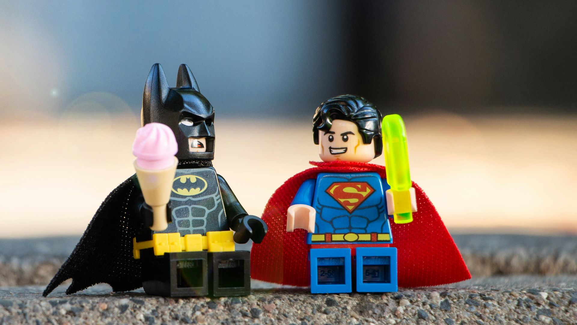 lego mini figure on brown sand