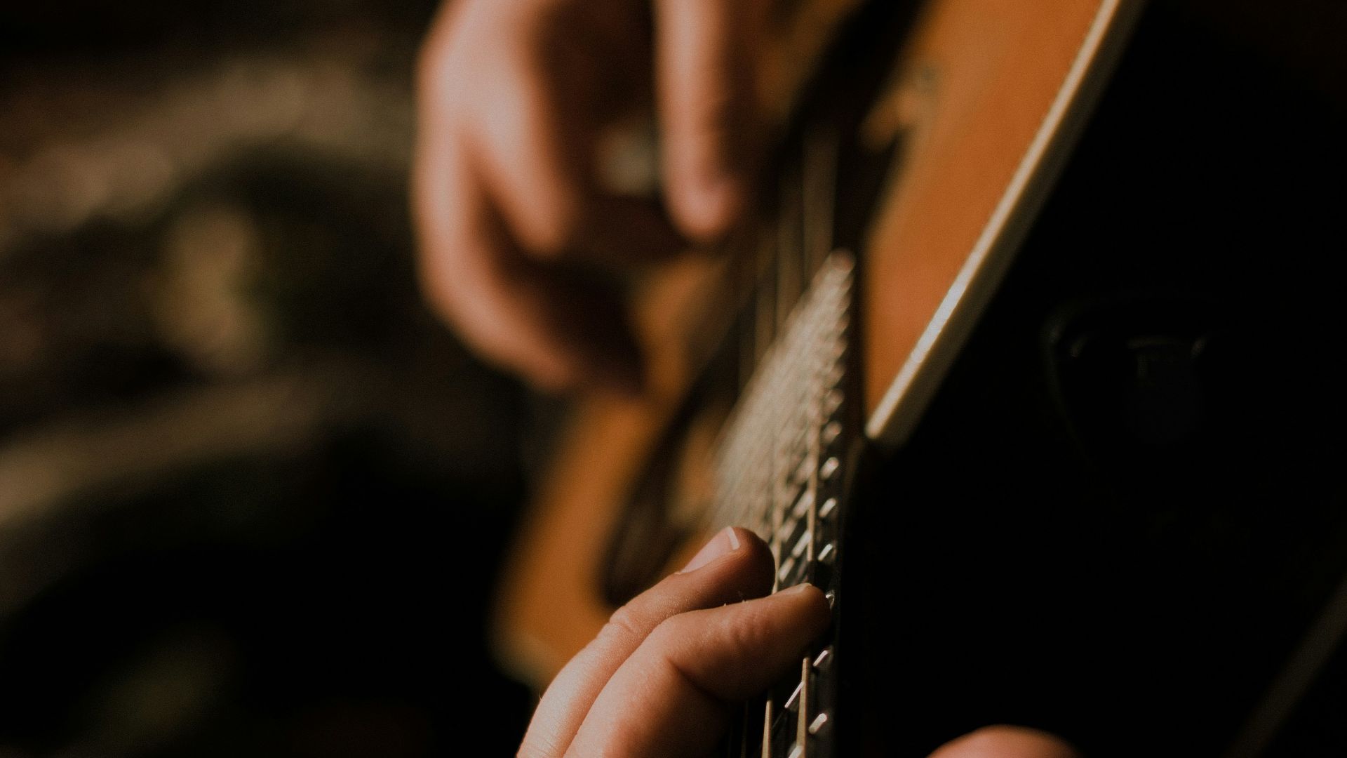 person playing guitar