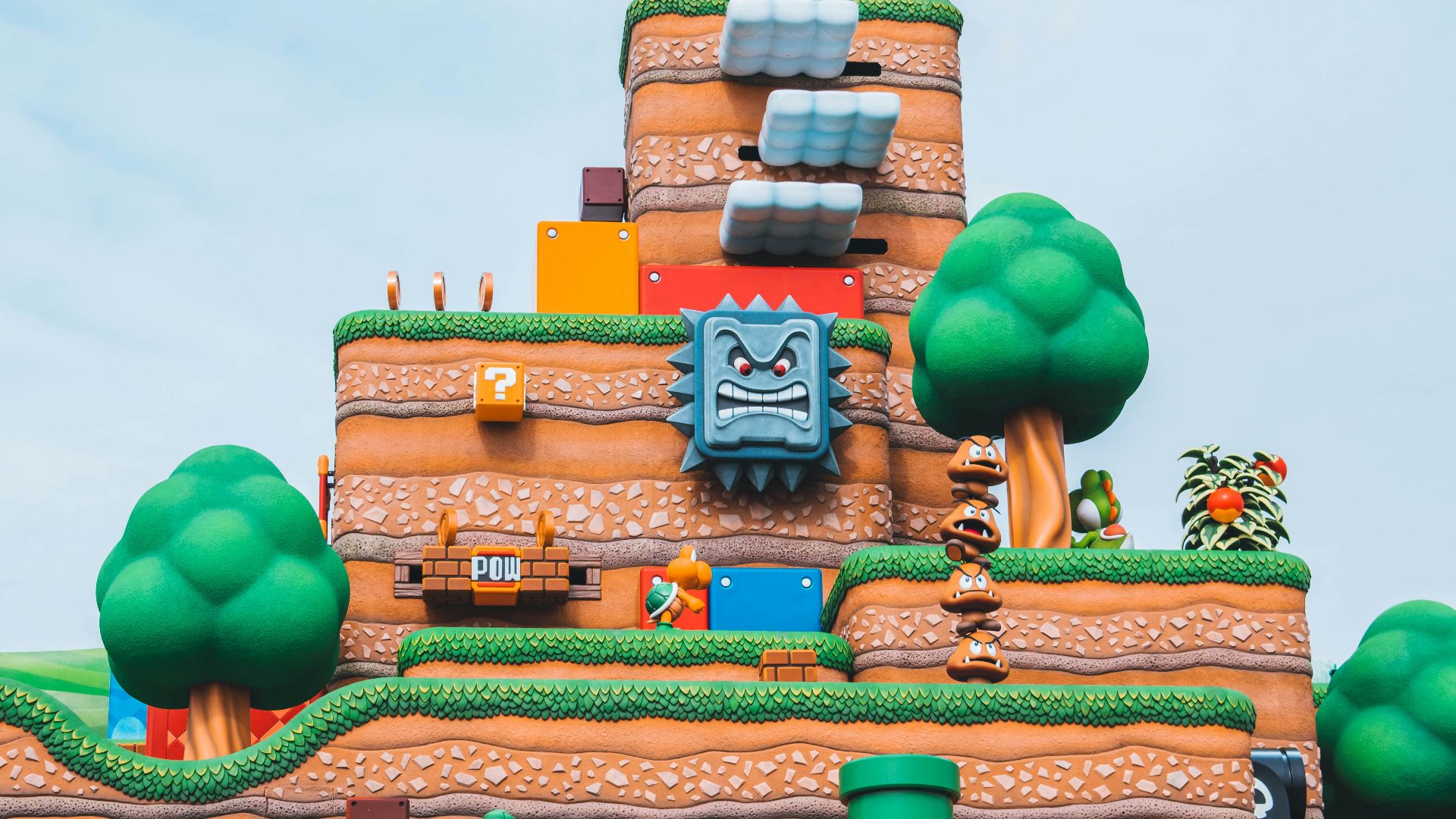 blue green and brown concrete building under blue sky during daytime