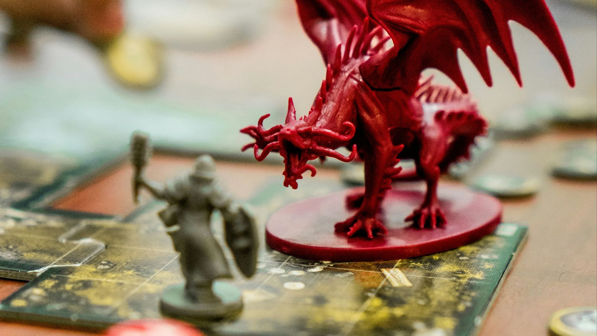 red dragon action figure on table