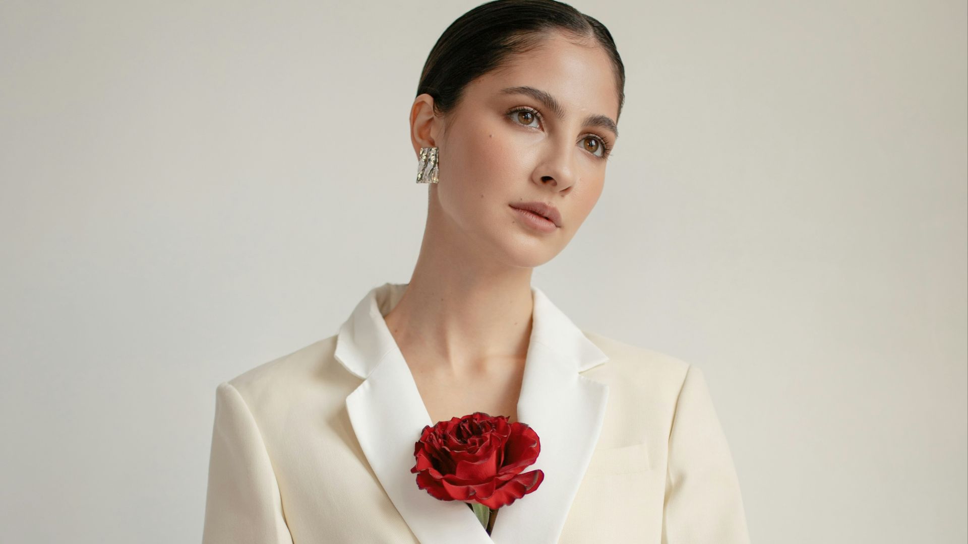 woman wearing white blazer