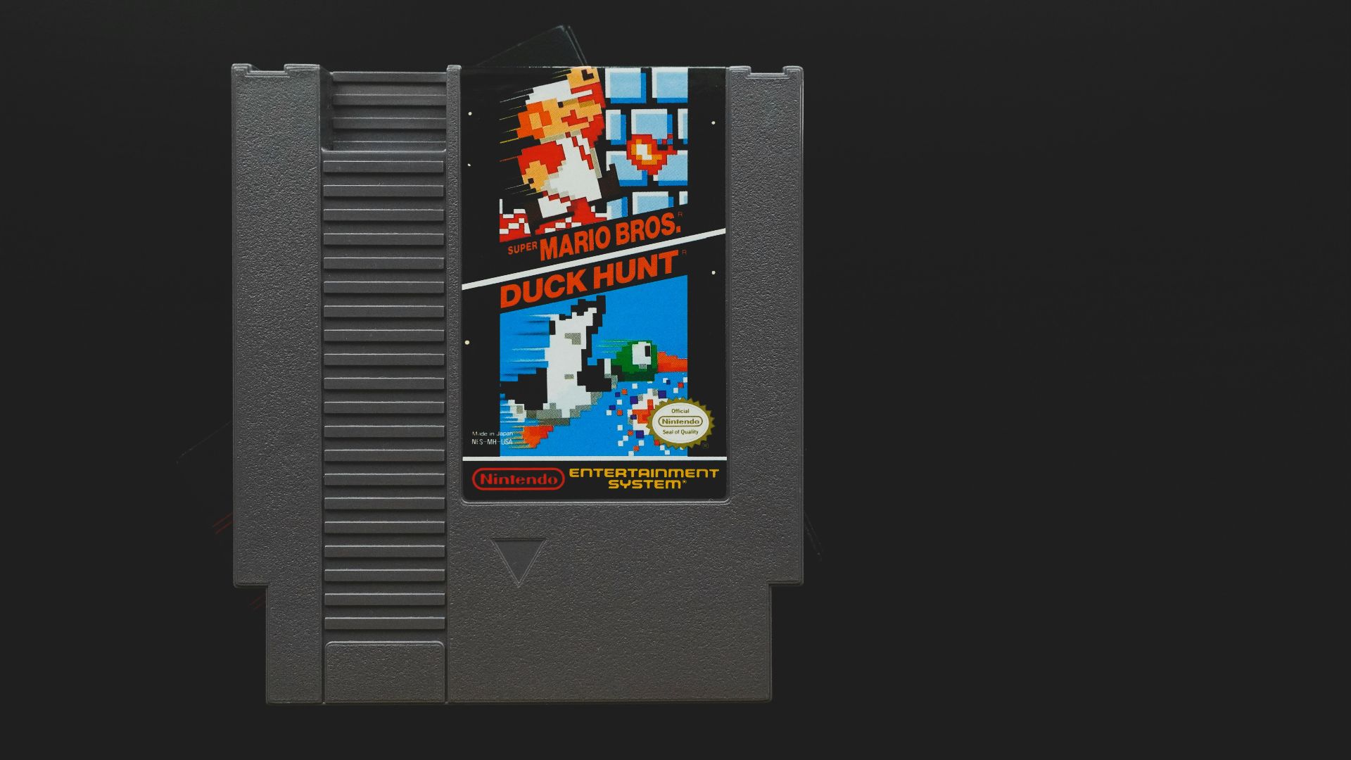 nintendo game boy cartridge on black surface