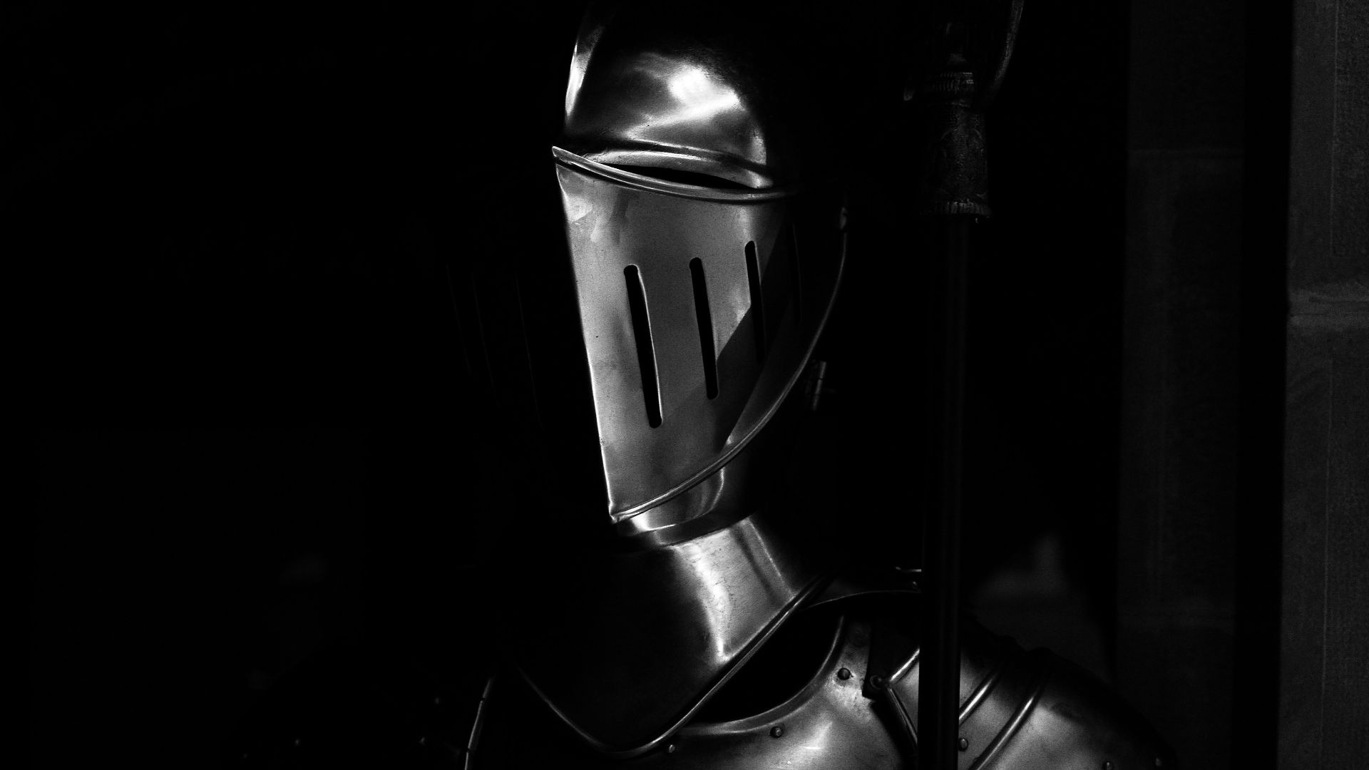 grayscale photography of armor
