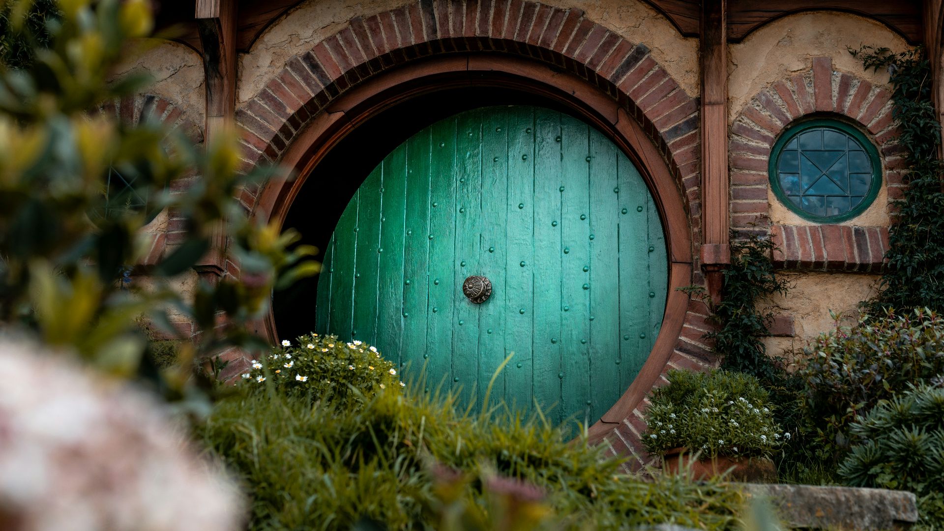 closed green wooden house