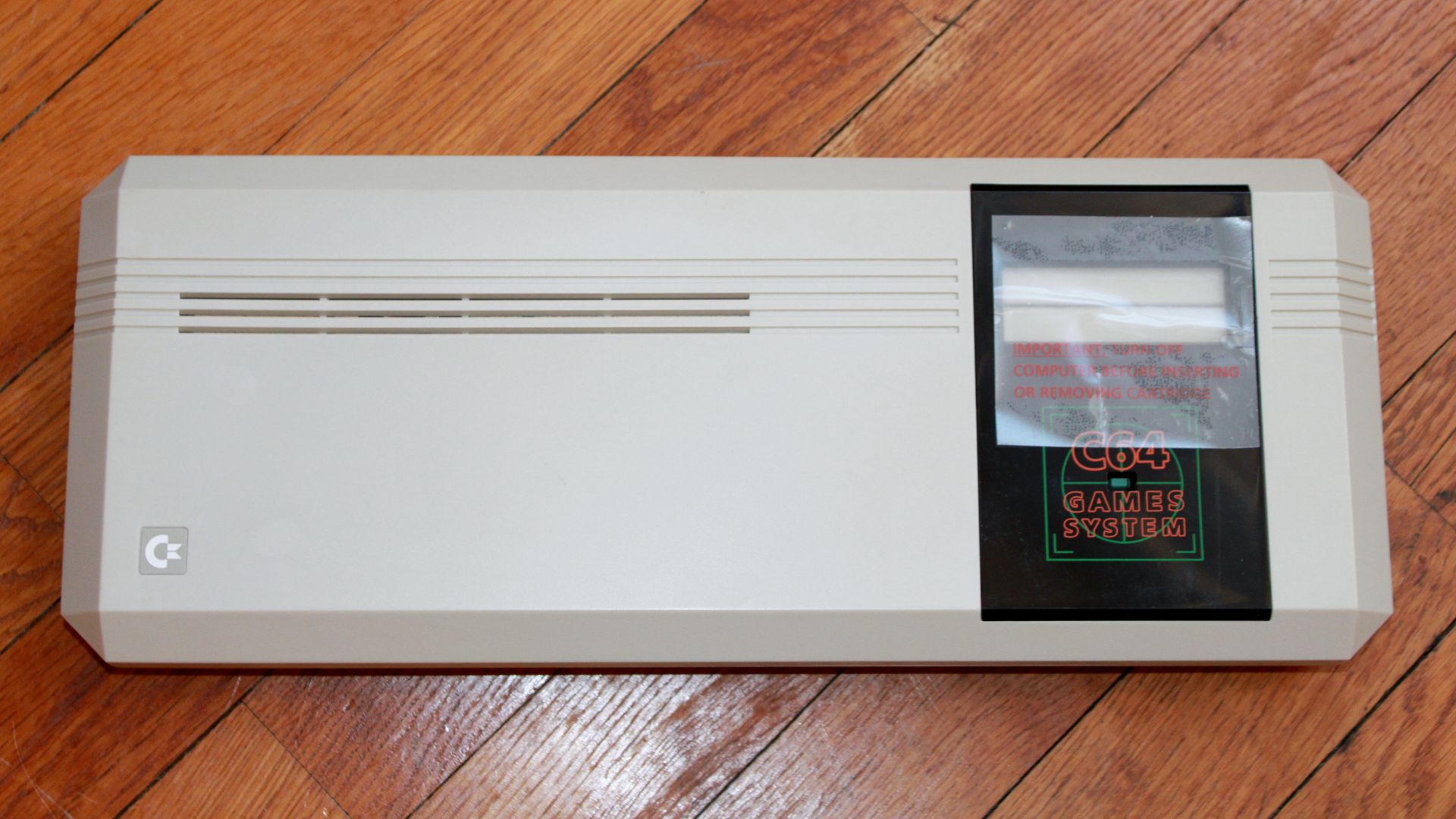 File:Commodore 64 Games System (w cart protector).jpg