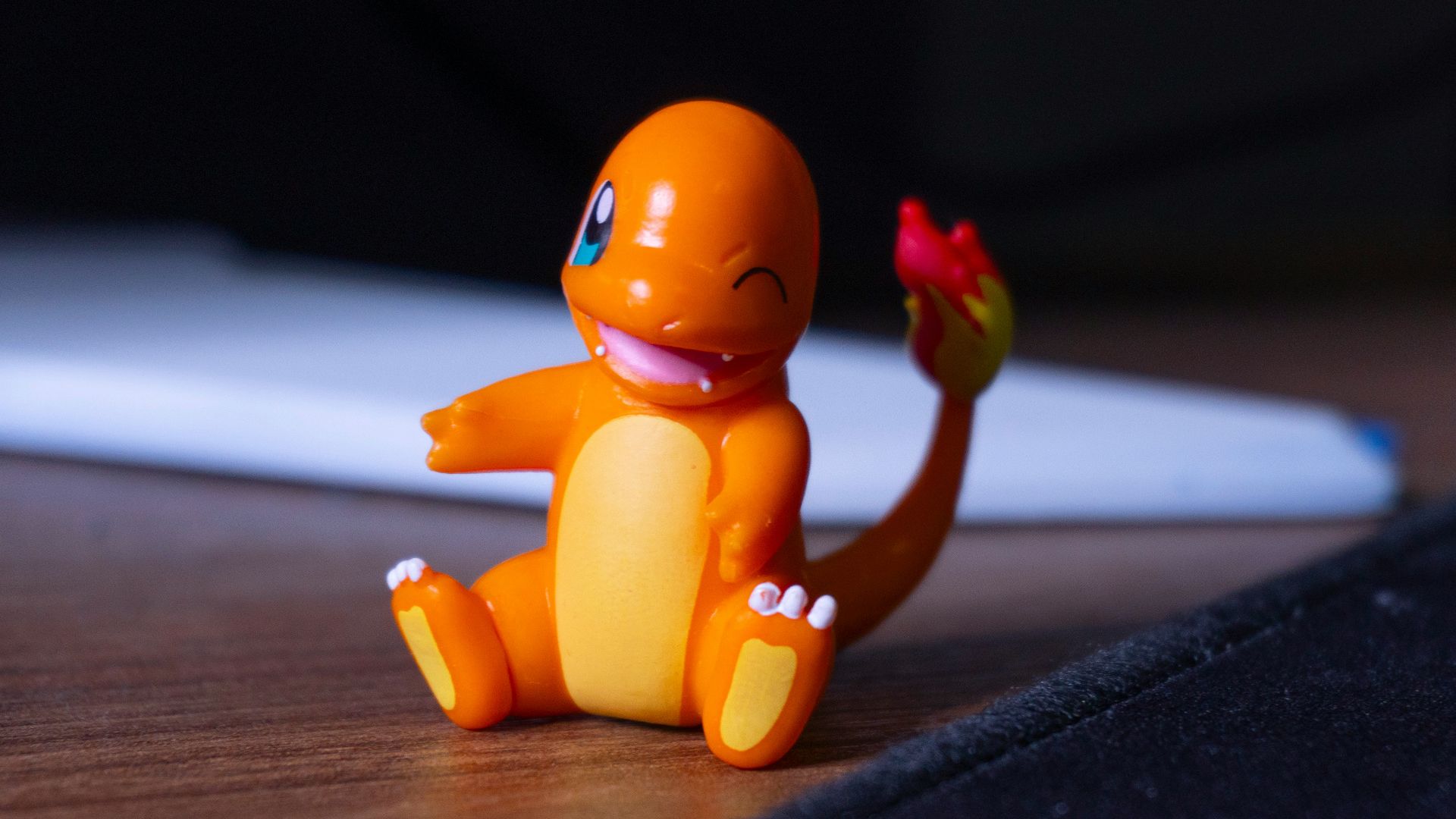 A small toy sitting on top of a wooden table