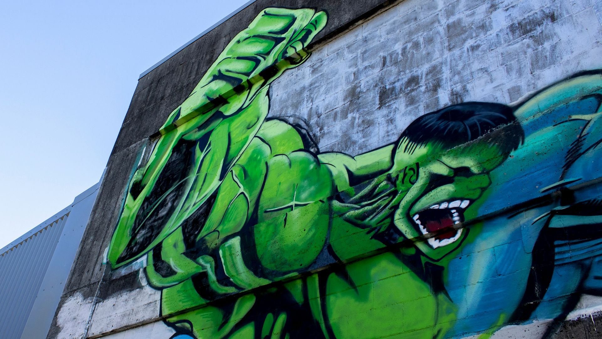 green and black dragon graffiti