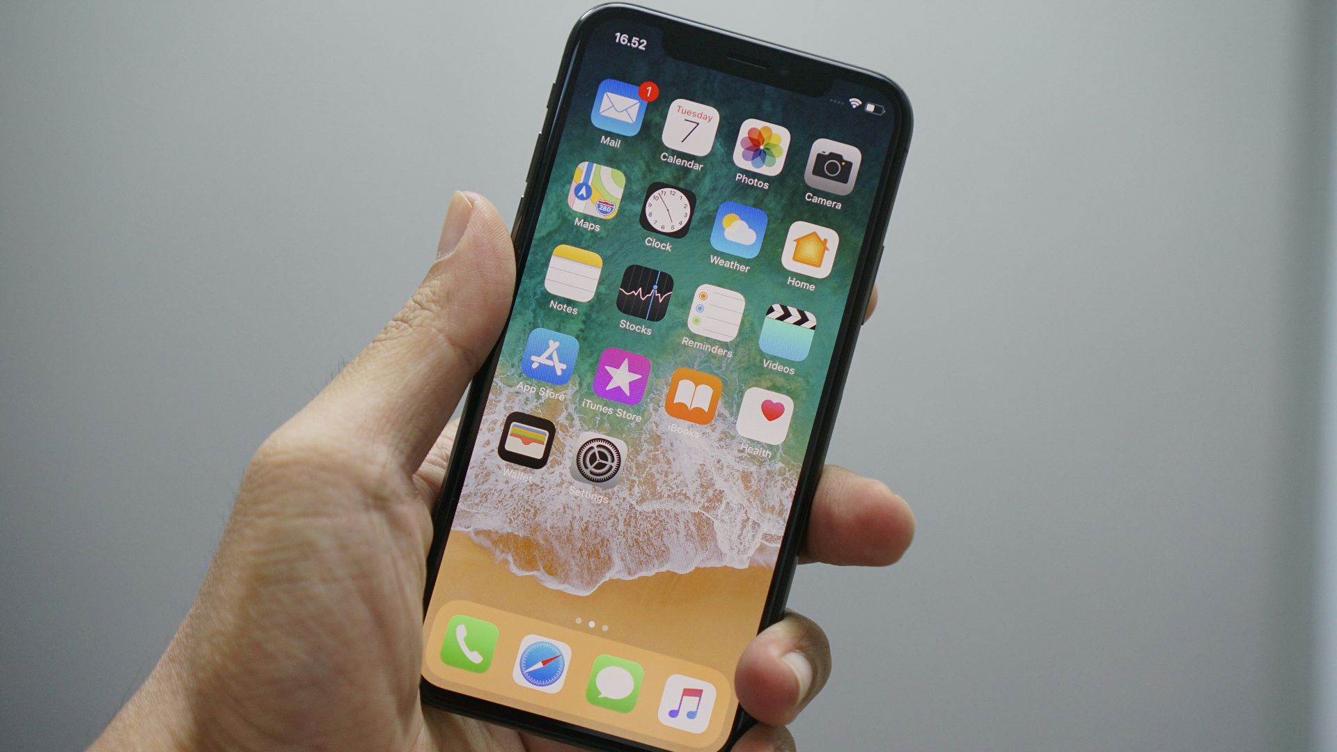 person holding space gray iPhone 7