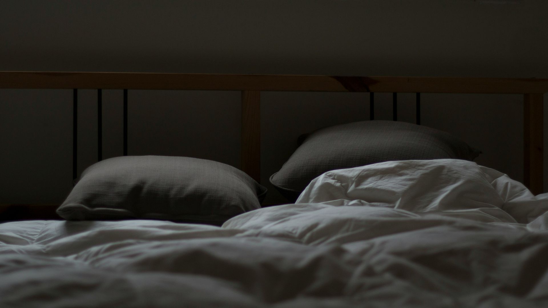 empty white and gray bed set