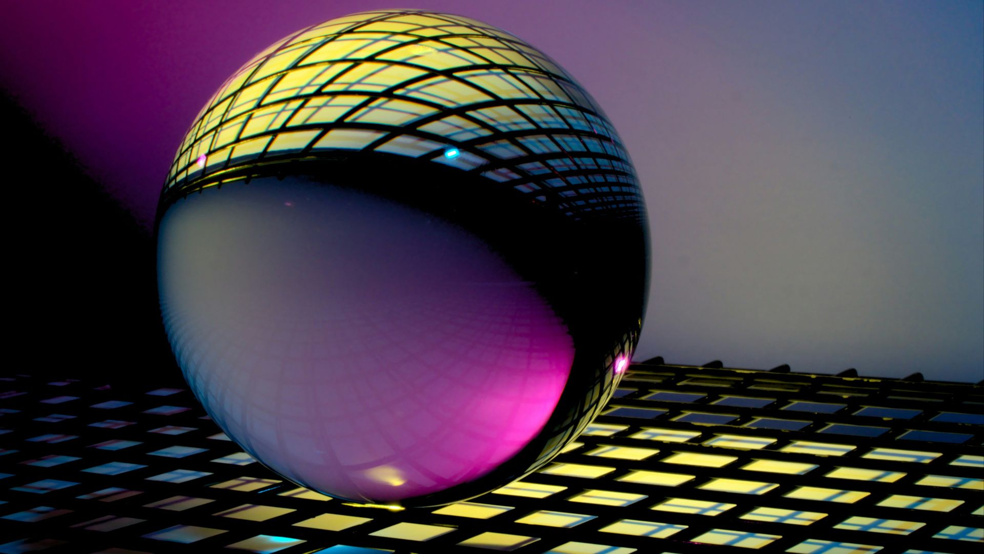 blue and black ball on blue and white checkered textile