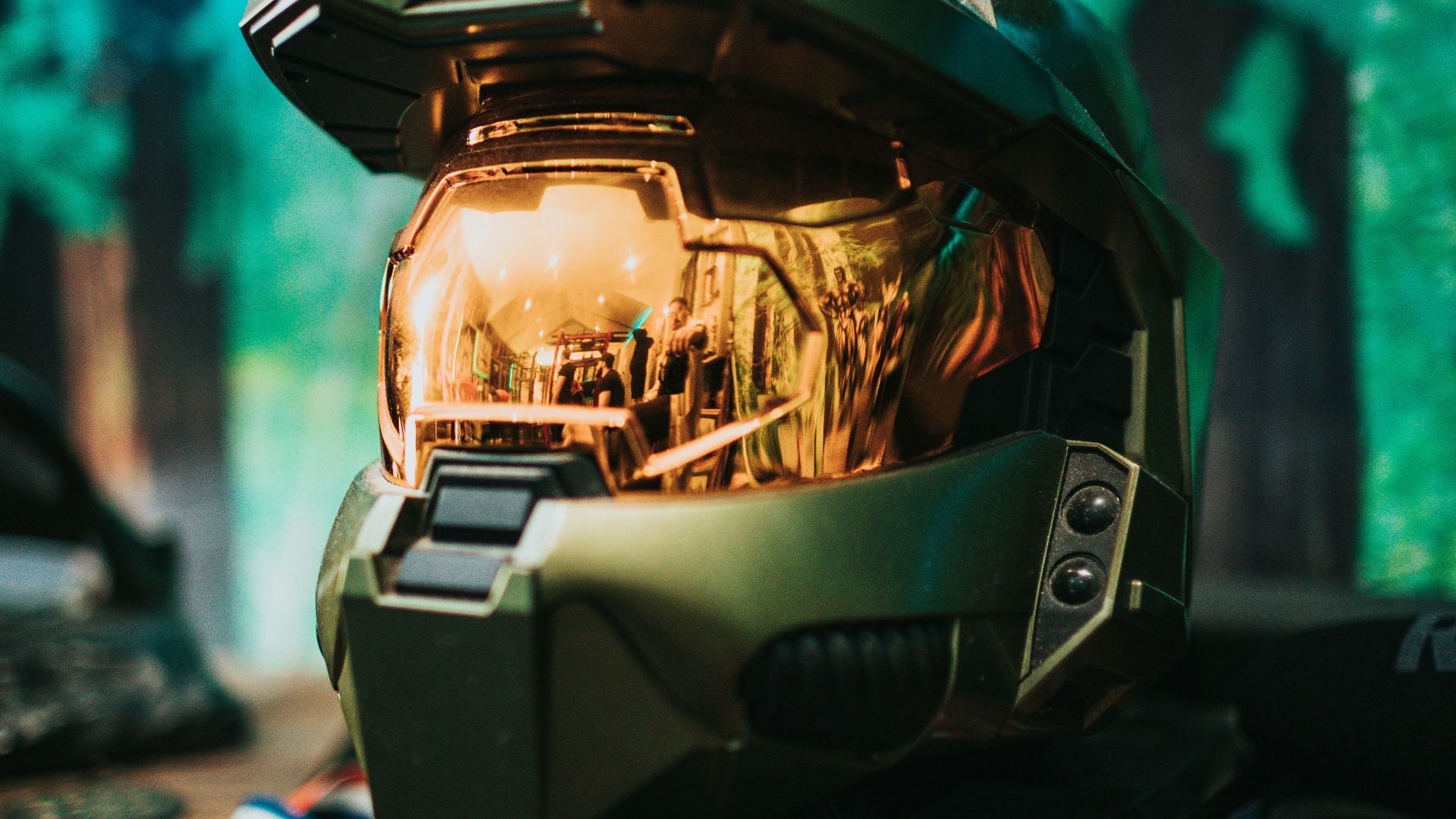 black and gray helmet on black and white textile