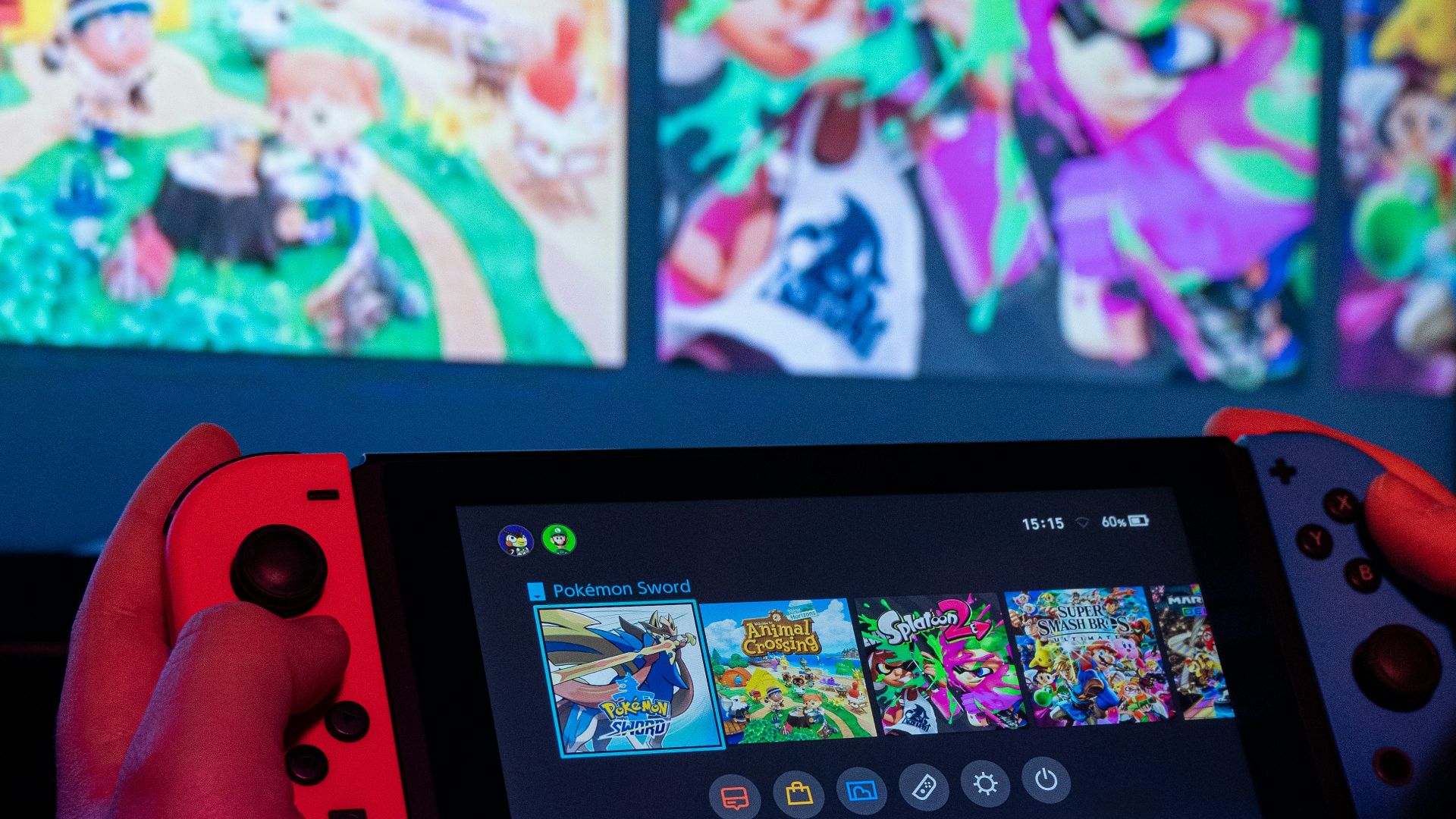 a person holding a nintendo wii game controller