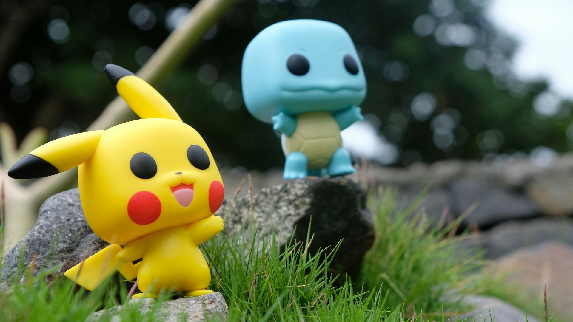 yellow and white duck plush toy on green grass during daytime