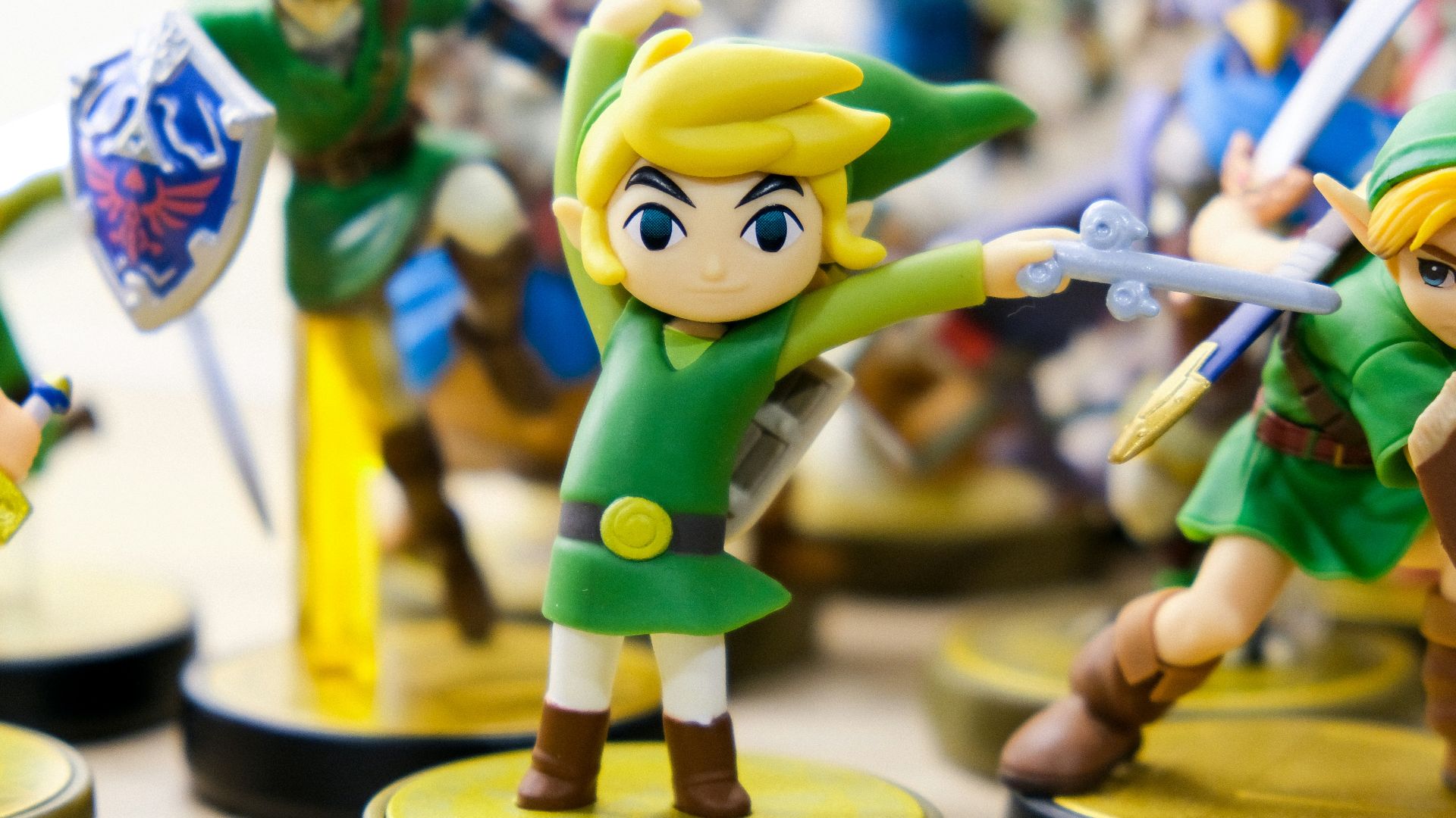 selective focus photography of Link vinyl figures