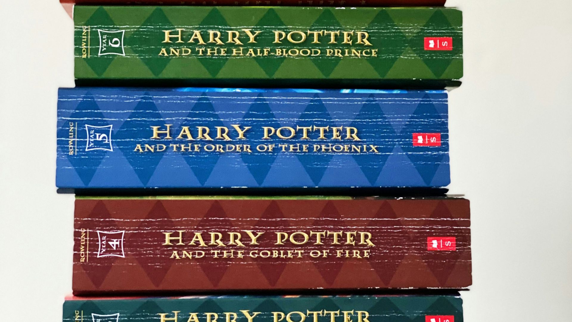 stack of books on white table