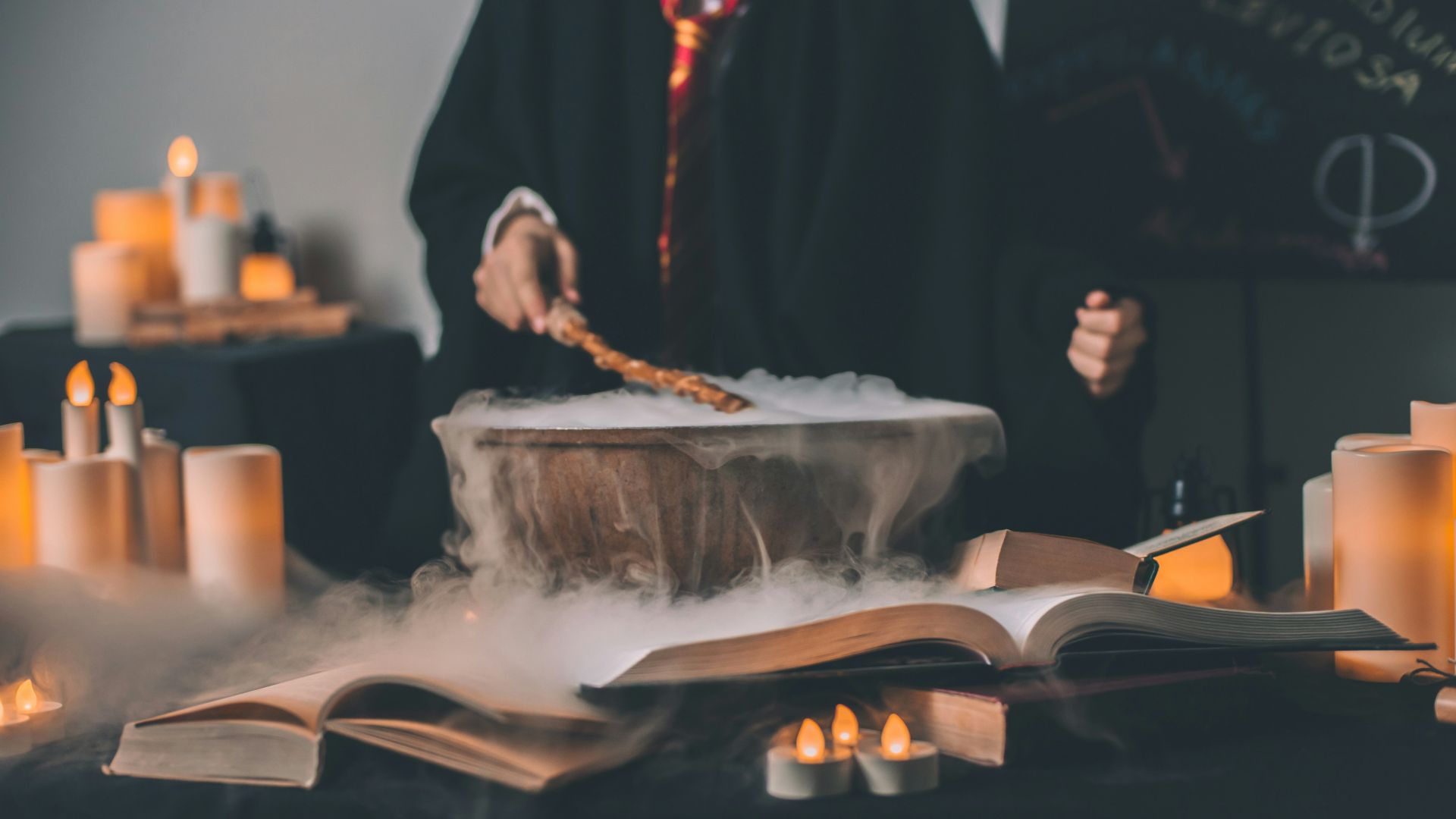 person holding wand on top of bowl