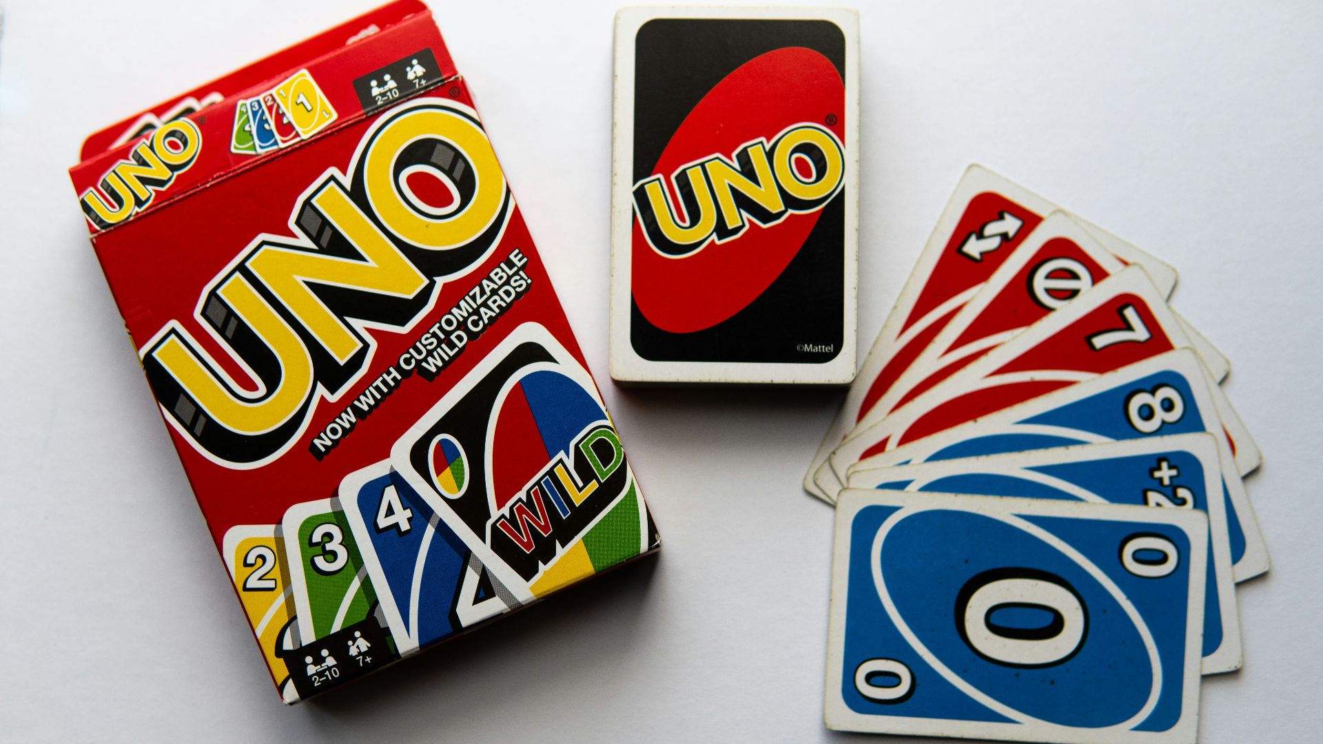 uno uno cards and a card game on a table