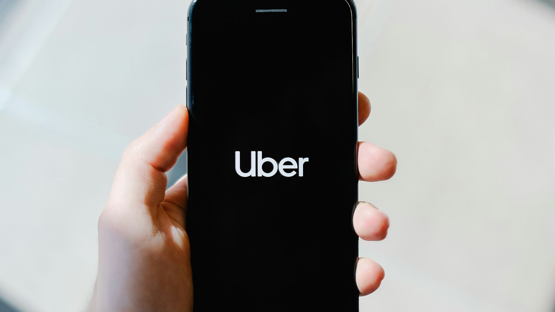 person holding black iphone 5