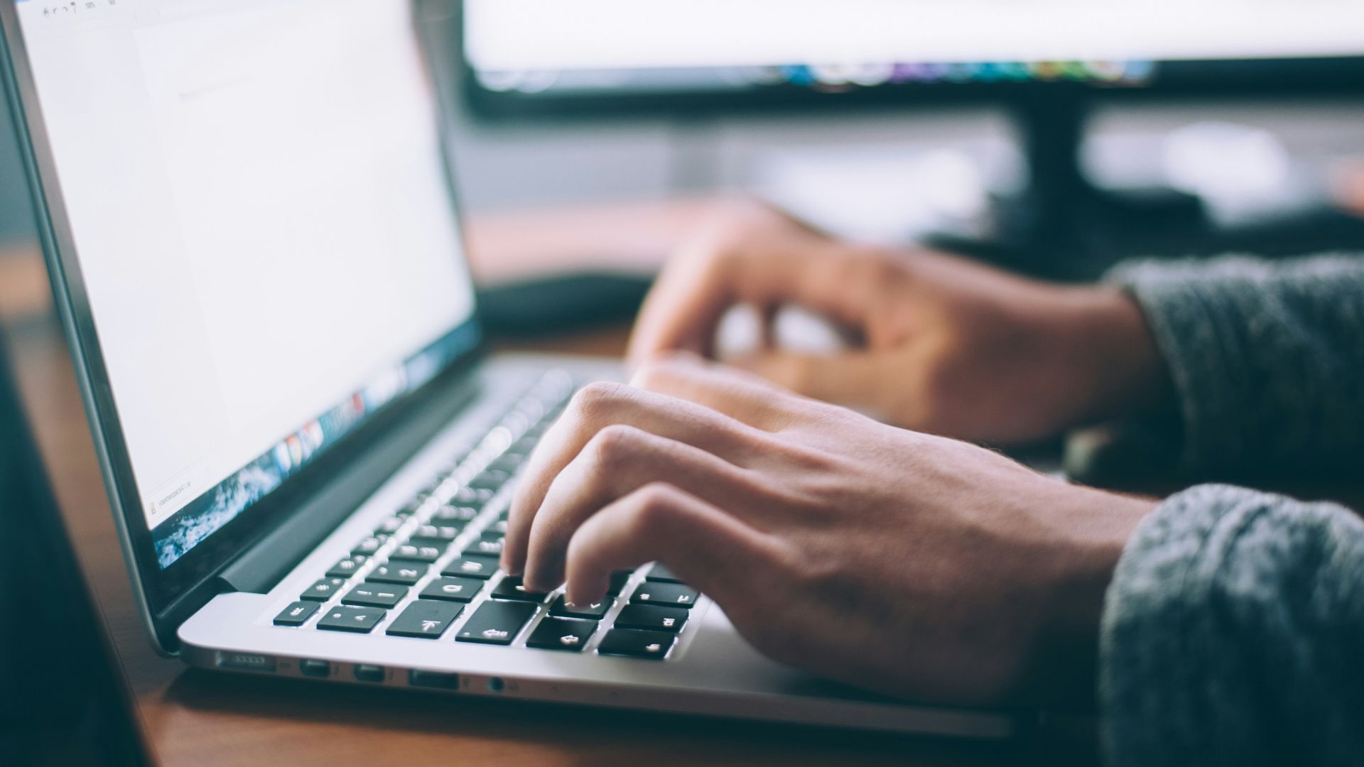 person using MacBook Pro