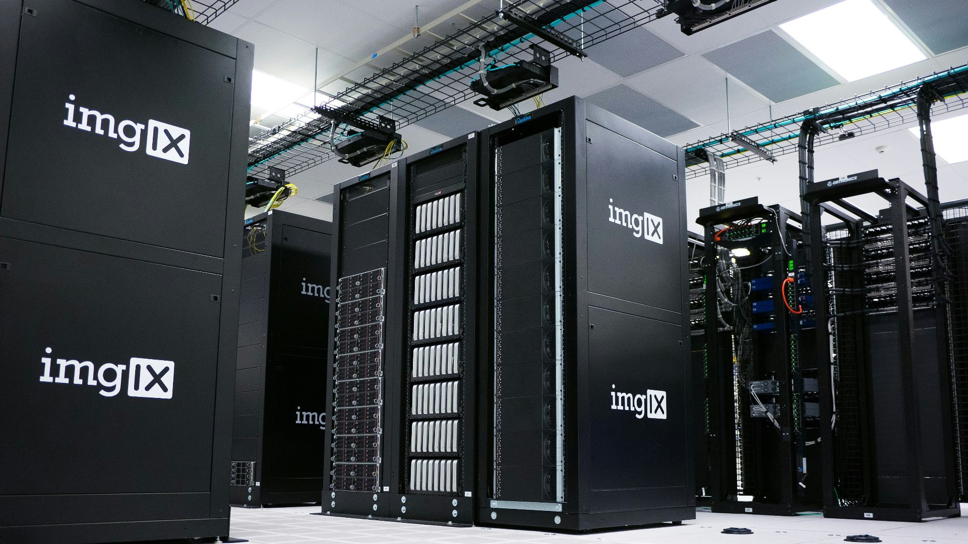 img IX mining rig inside white and gray room