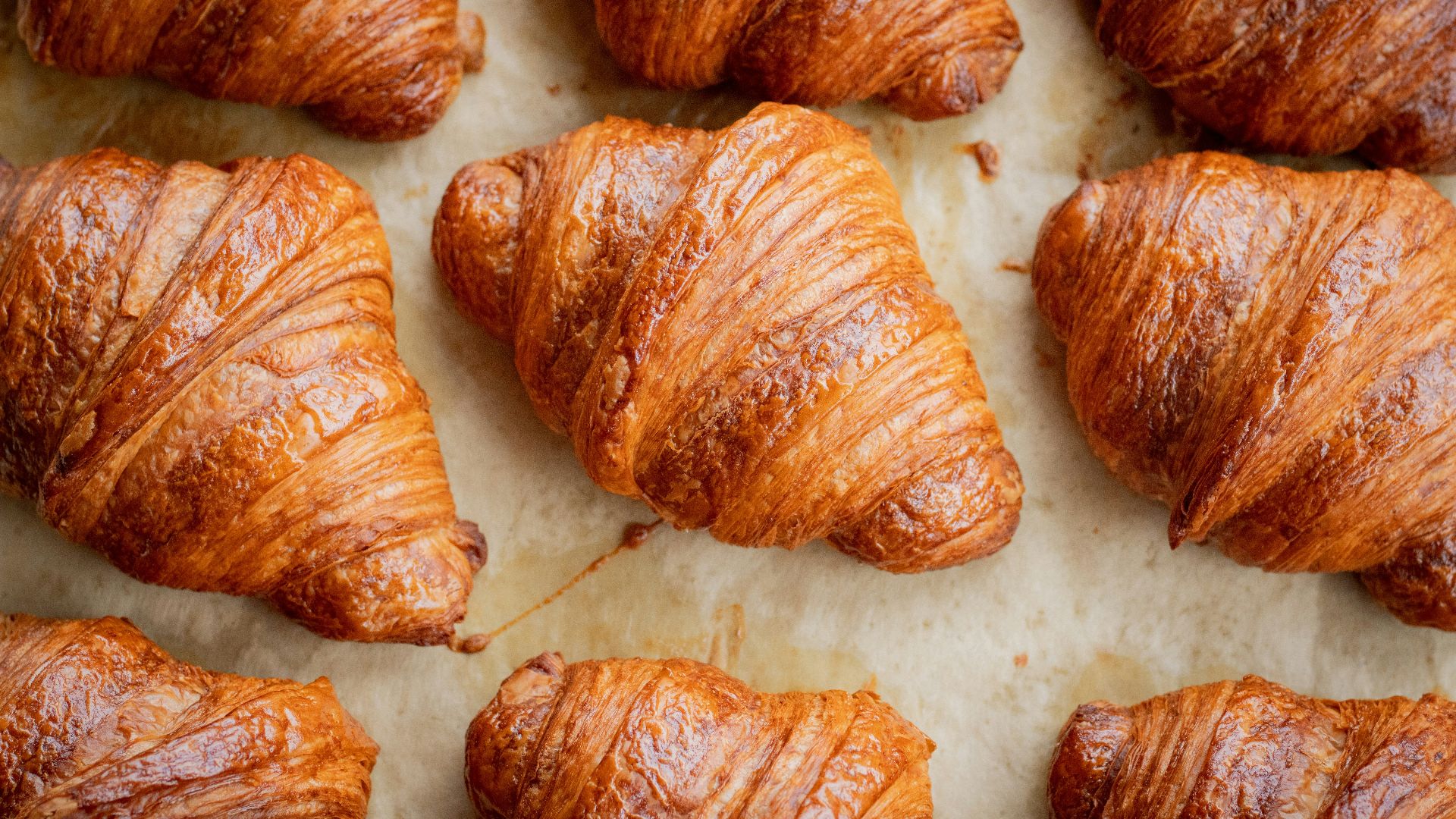 a bunch of croissants that are on a table
