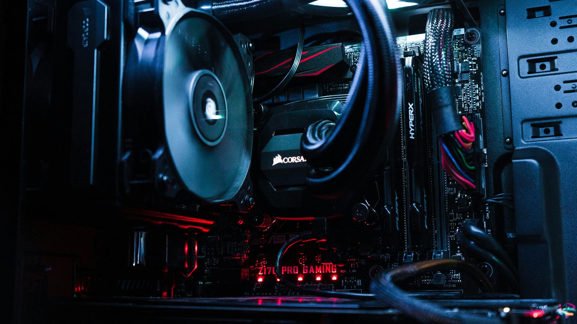 turned-on black and red computer tower