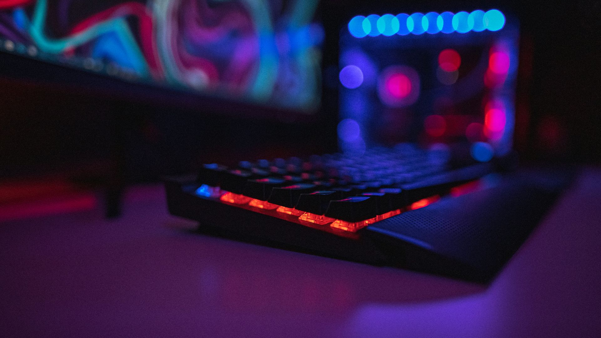 black computer keyboard on brown wooden table