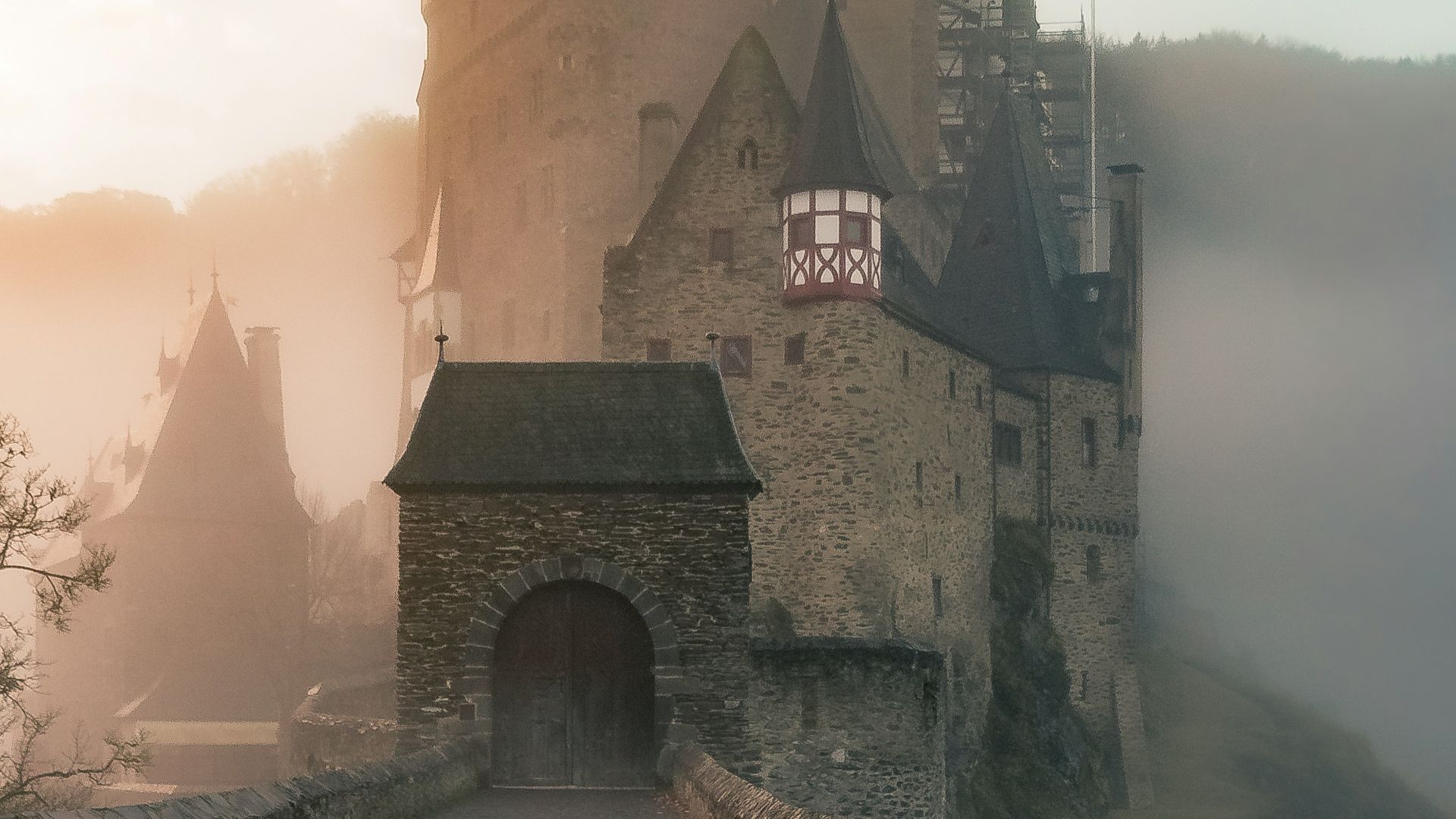 reflection of a castle surrounded with fogs