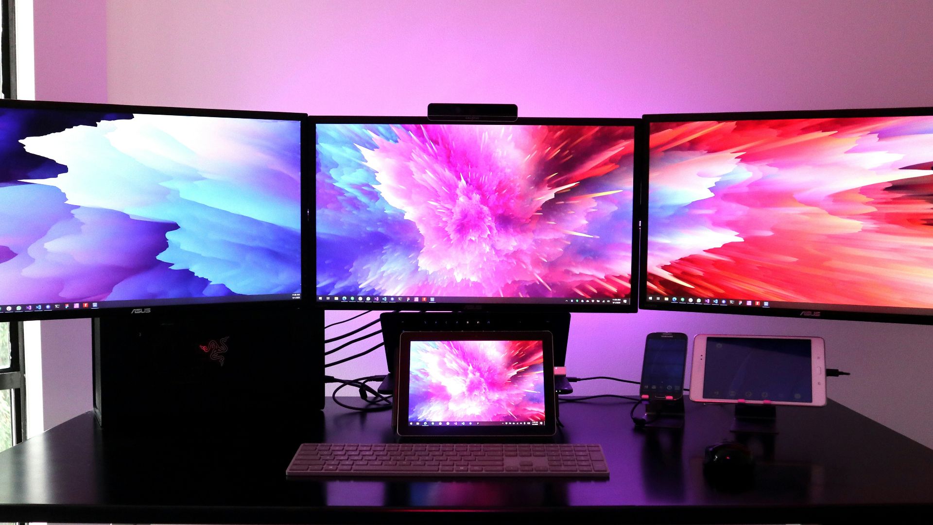 black flat screen tv on white wooden table