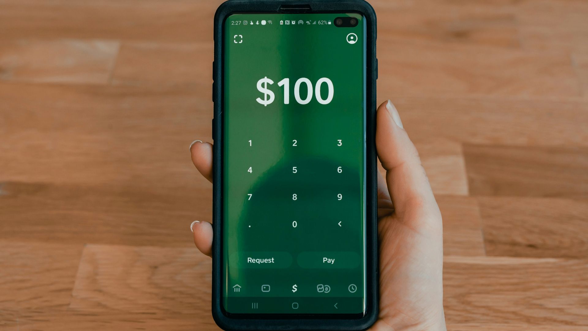 person holding black android smartphone