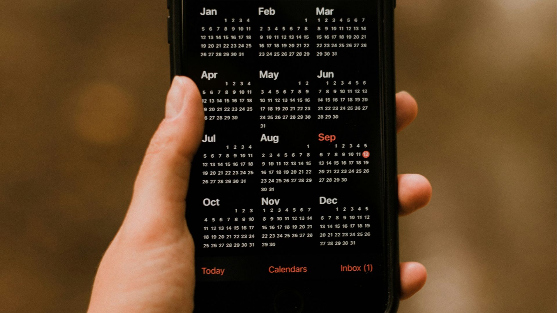 person holding black android smartphone