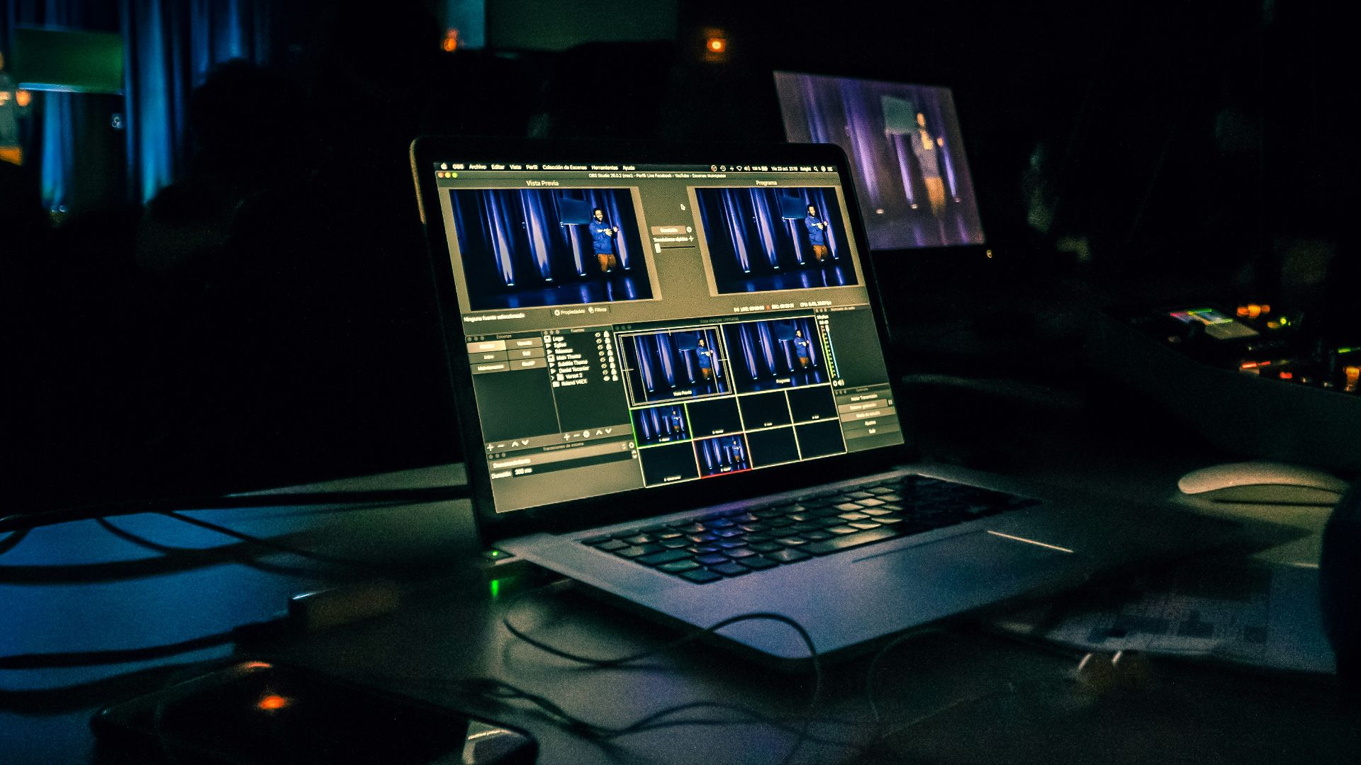 black laptop computer turned on on table