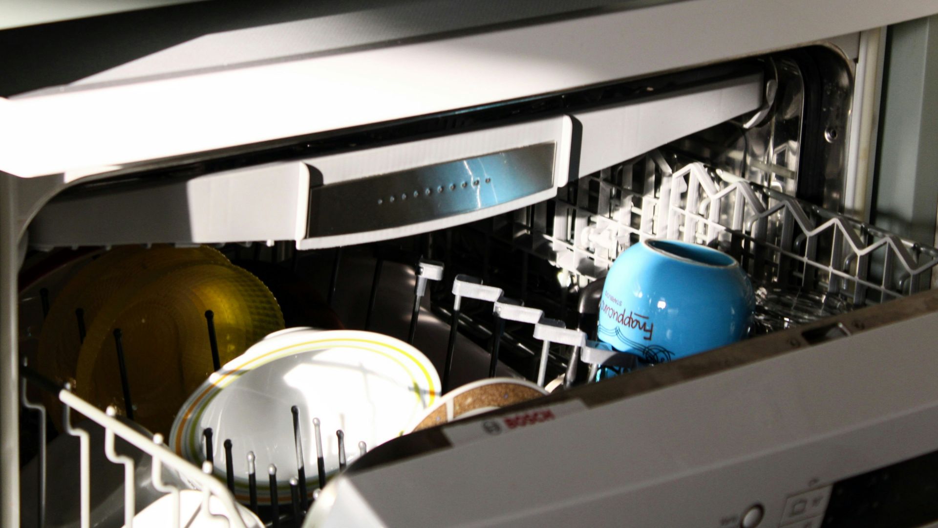 blue and white cooking pot on stove