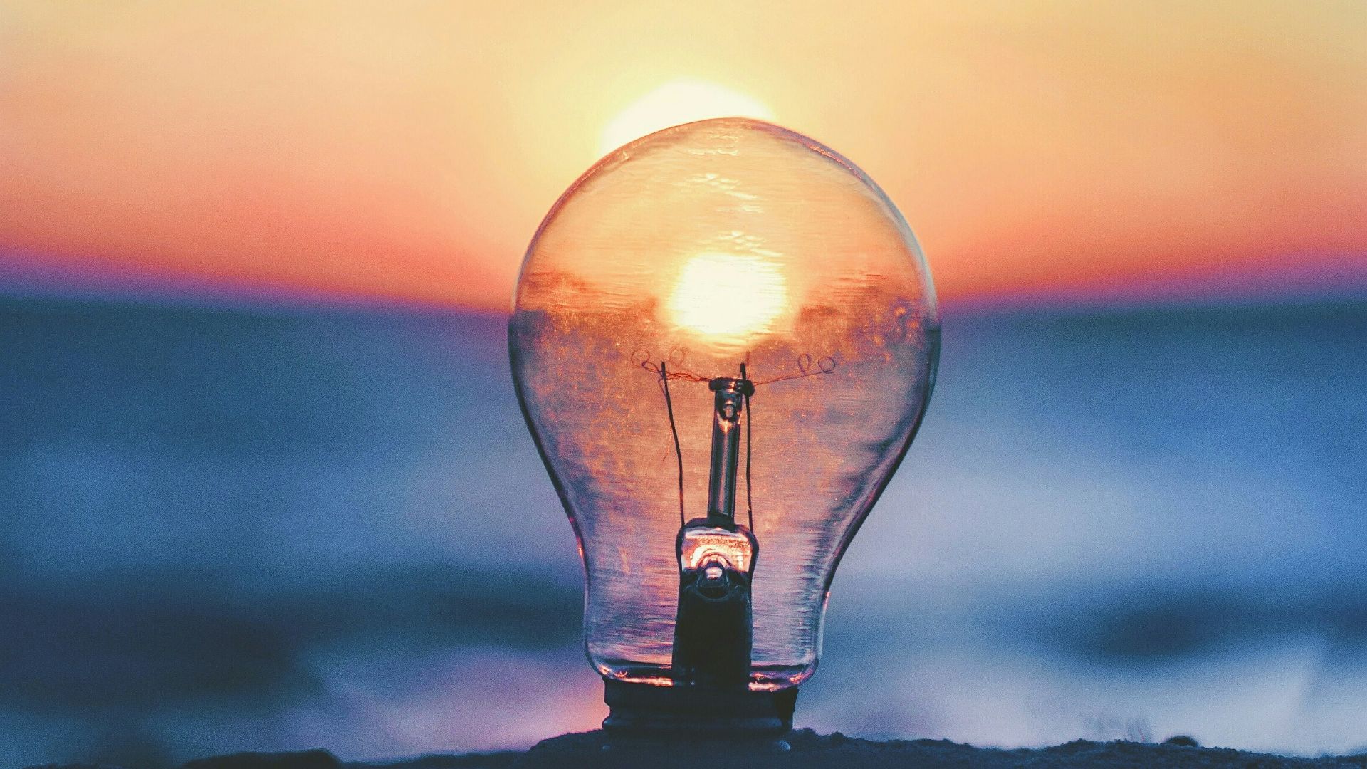 selective focus photography of light bulb