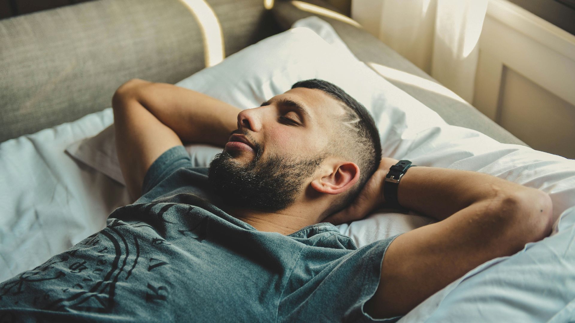 man lying on bed