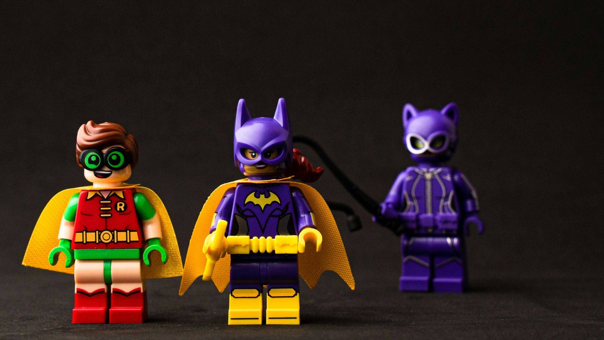 two yellow and purple robot toys