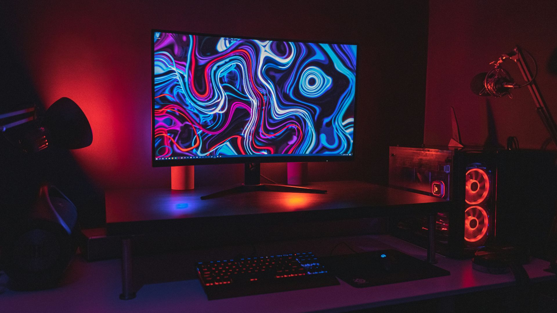 black flat screen computer monitor turned on near black computer keyboard