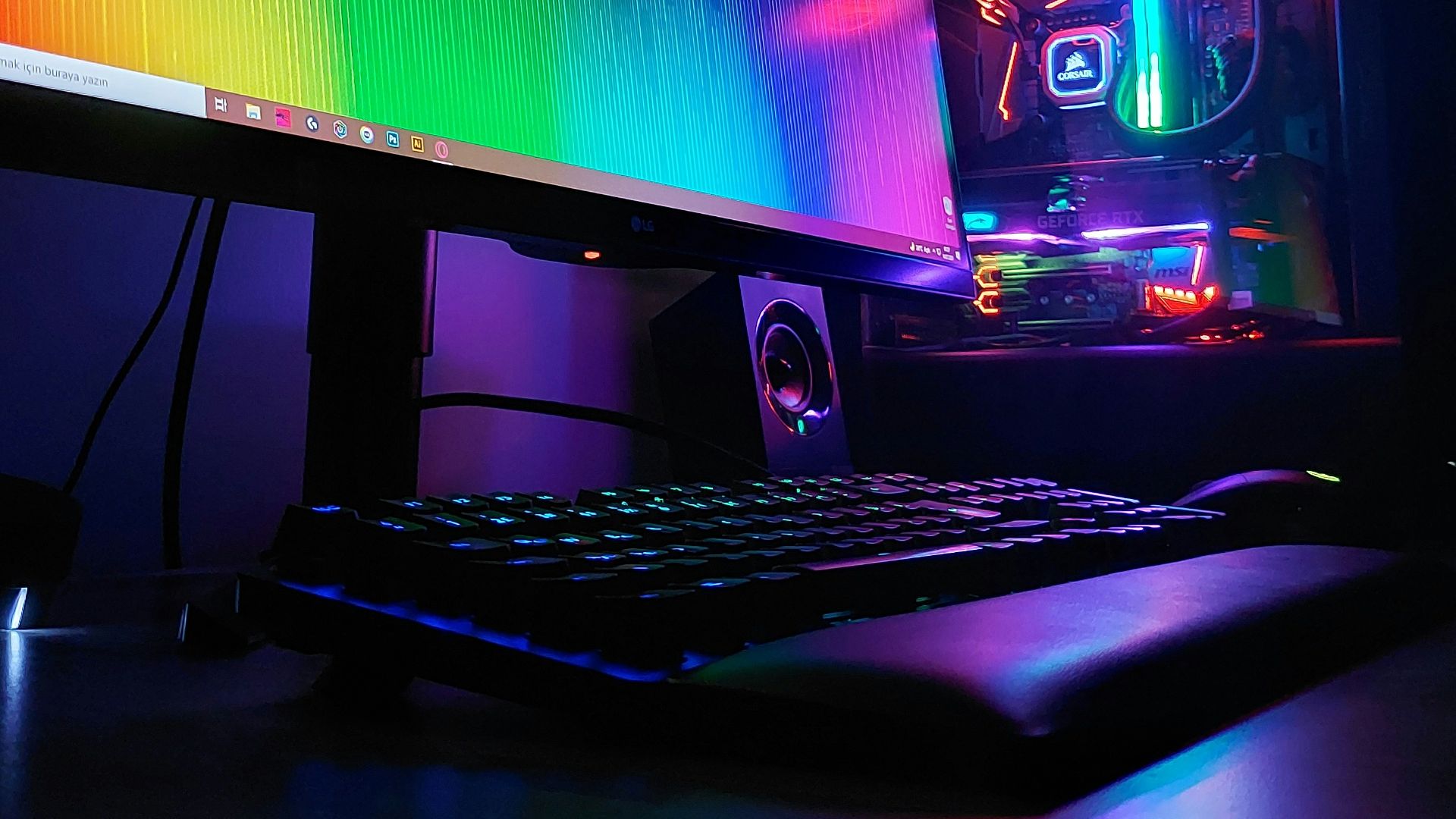 black flat screen computer monitor turned on beside black computer keyboard