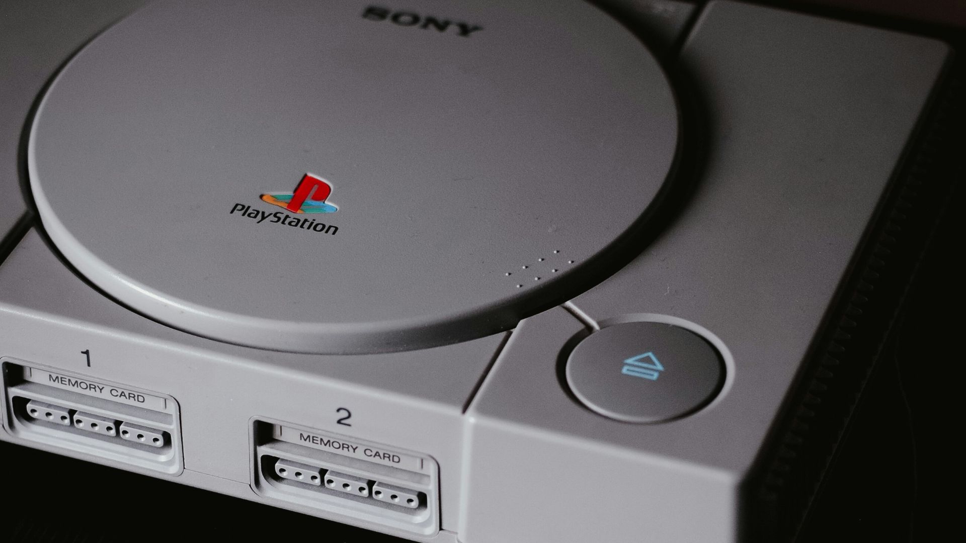 photo of closed Sony PS1 with DualShock 1