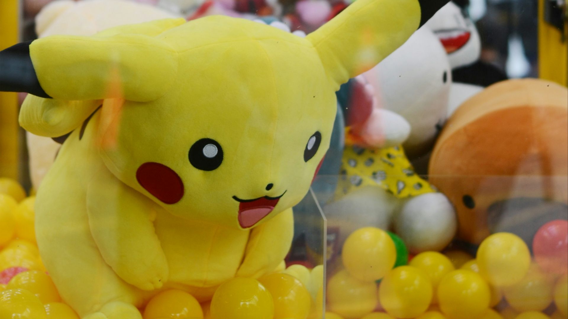 Pokemon Pikachu plush toy in claw machine