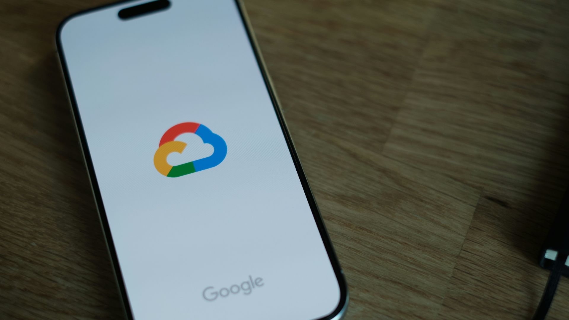 A close up of a cell phone on a table