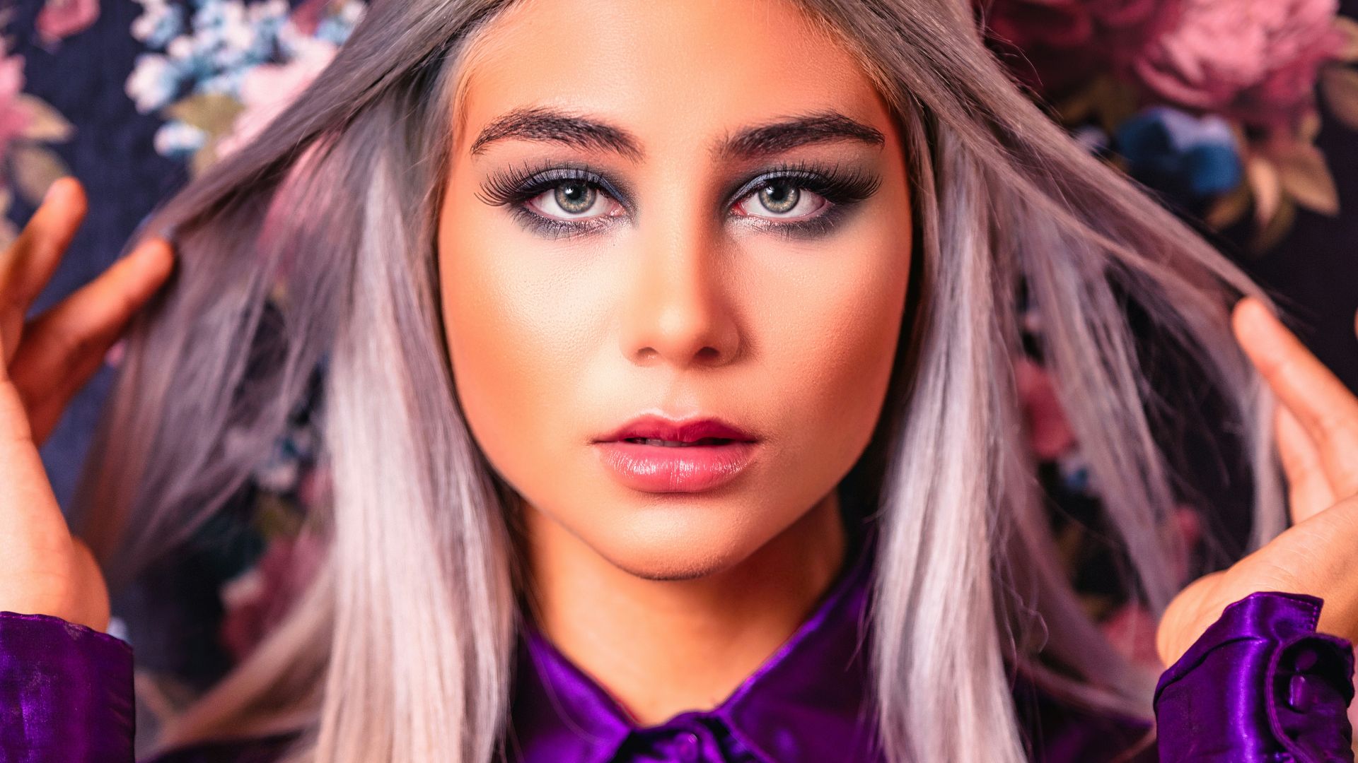 woman in purple long sleeve shirt