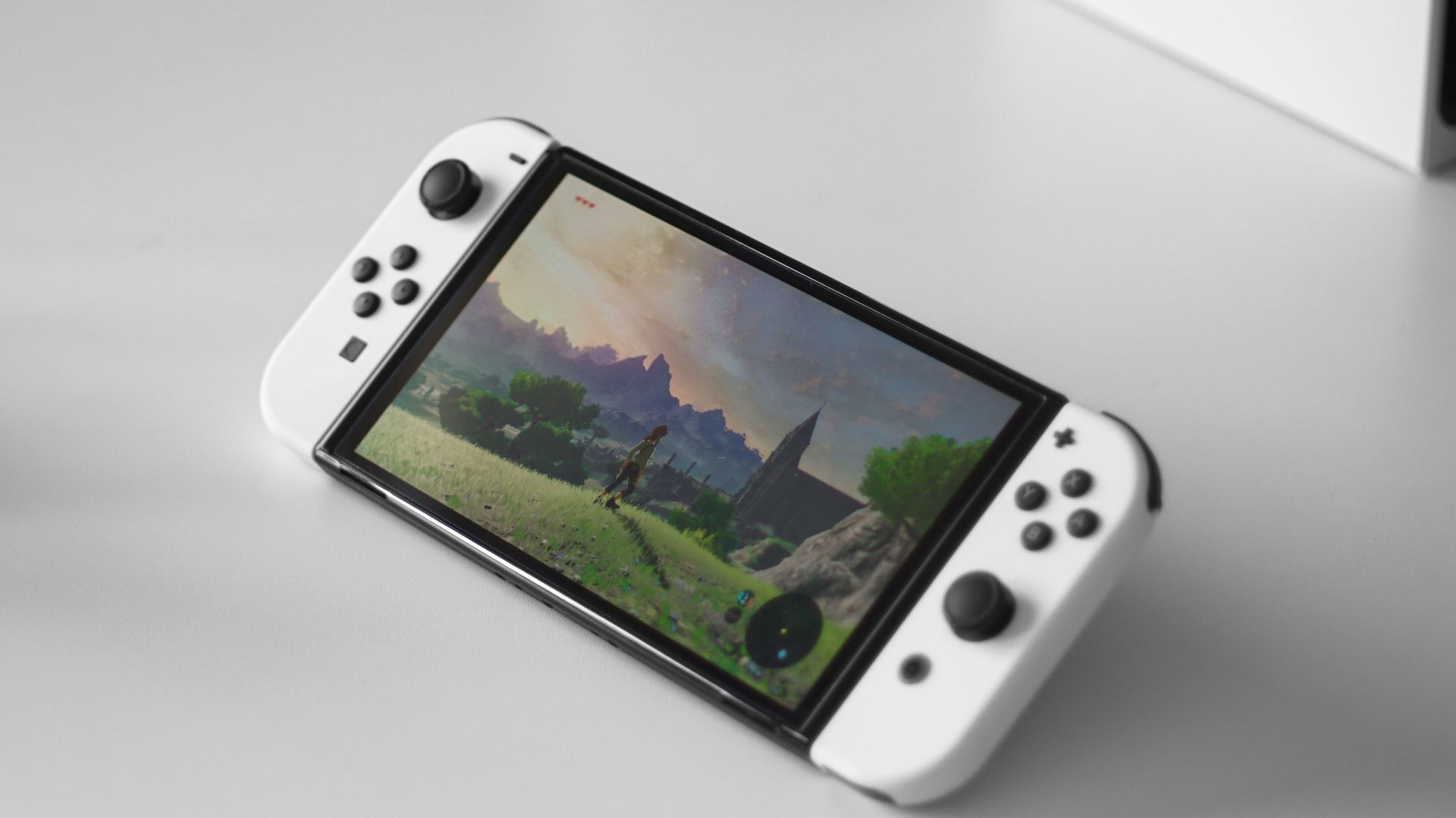 a nintendo wii game controller sitting on top of a table