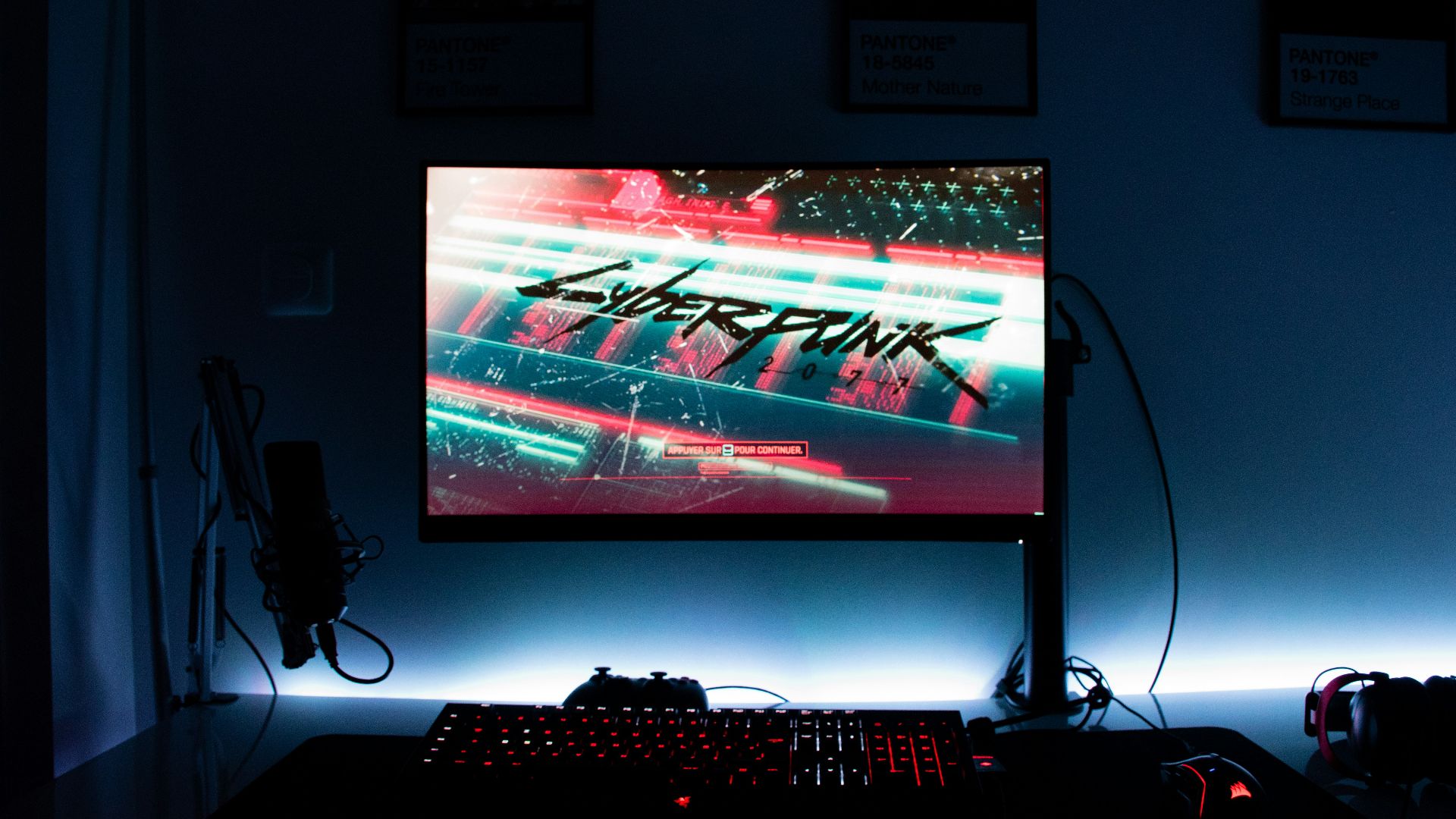 a computer monitor sitting on top of a desk