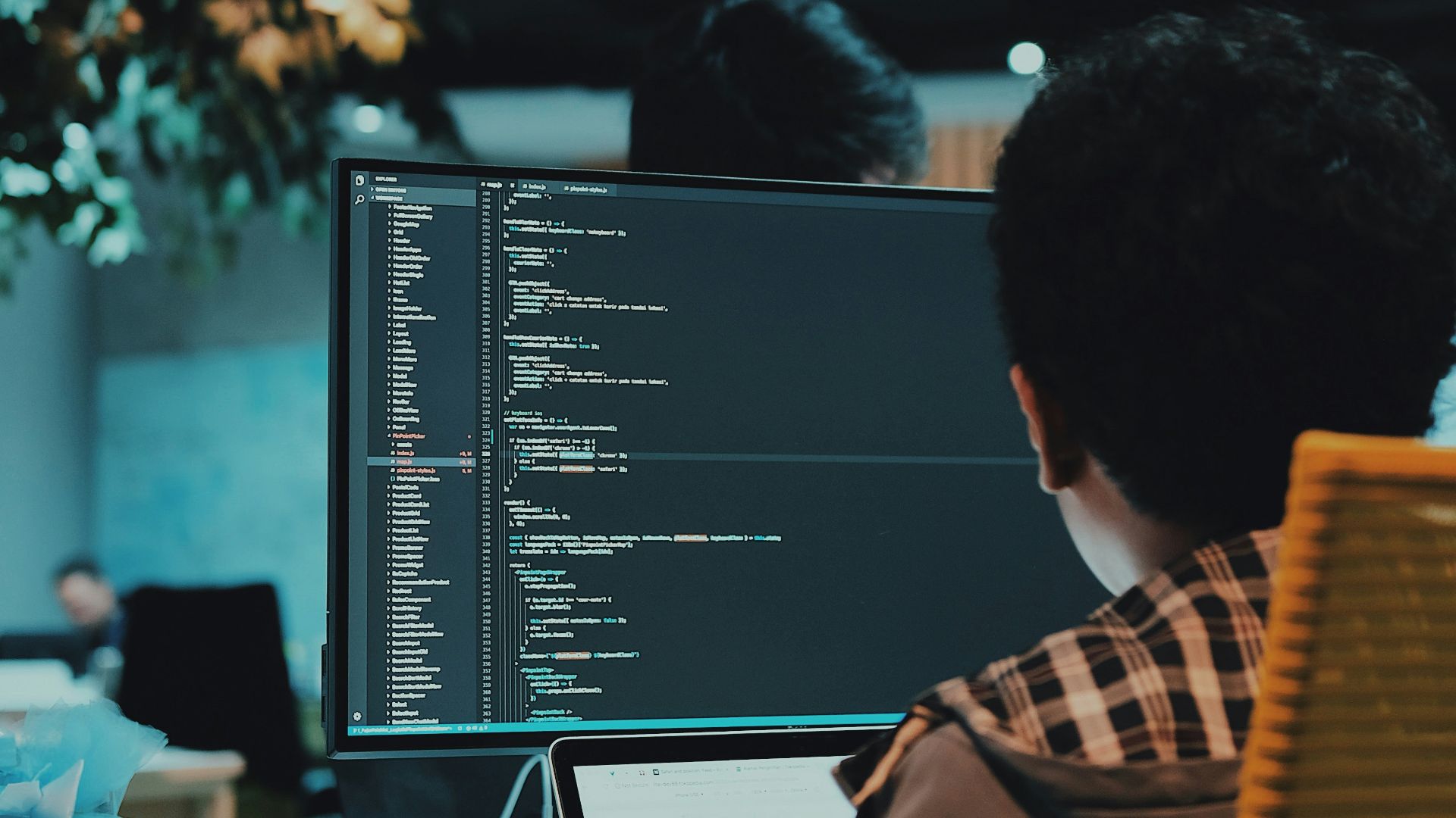 boy in front of computer monitor