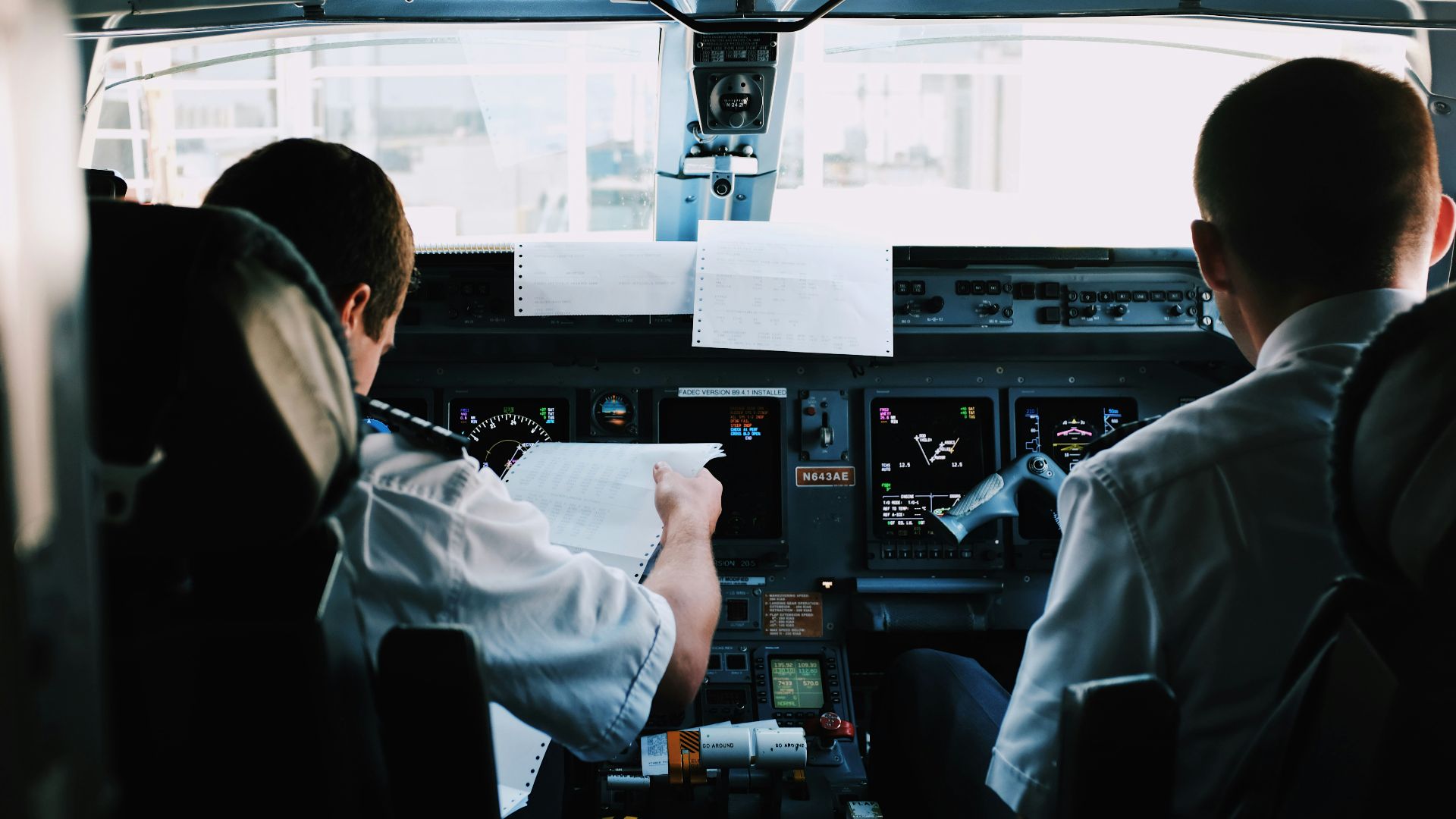 two men inside the plane