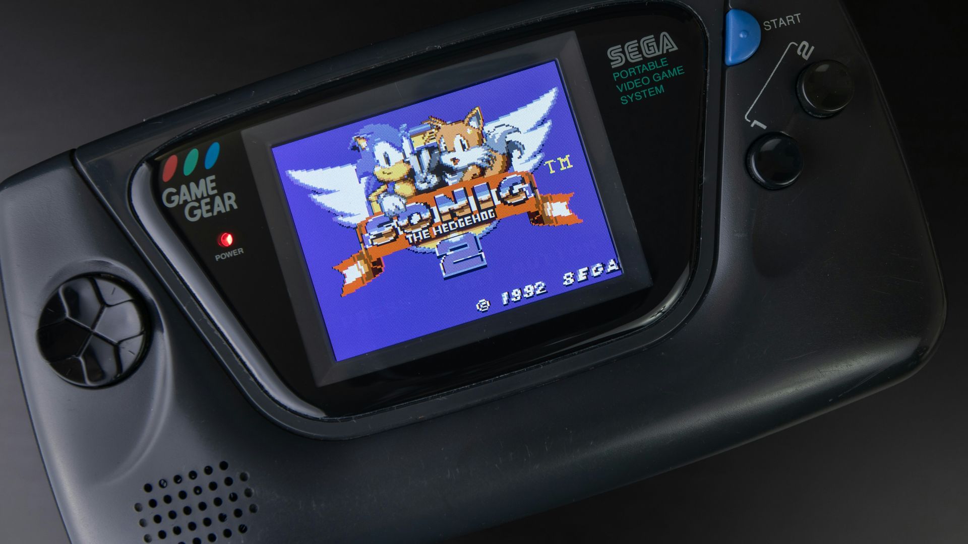 black sony digital device on black surface