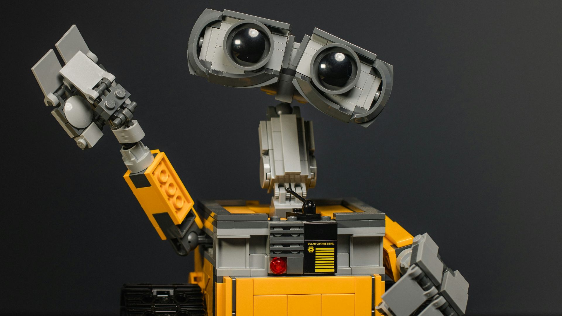 yellow and gray robot toy